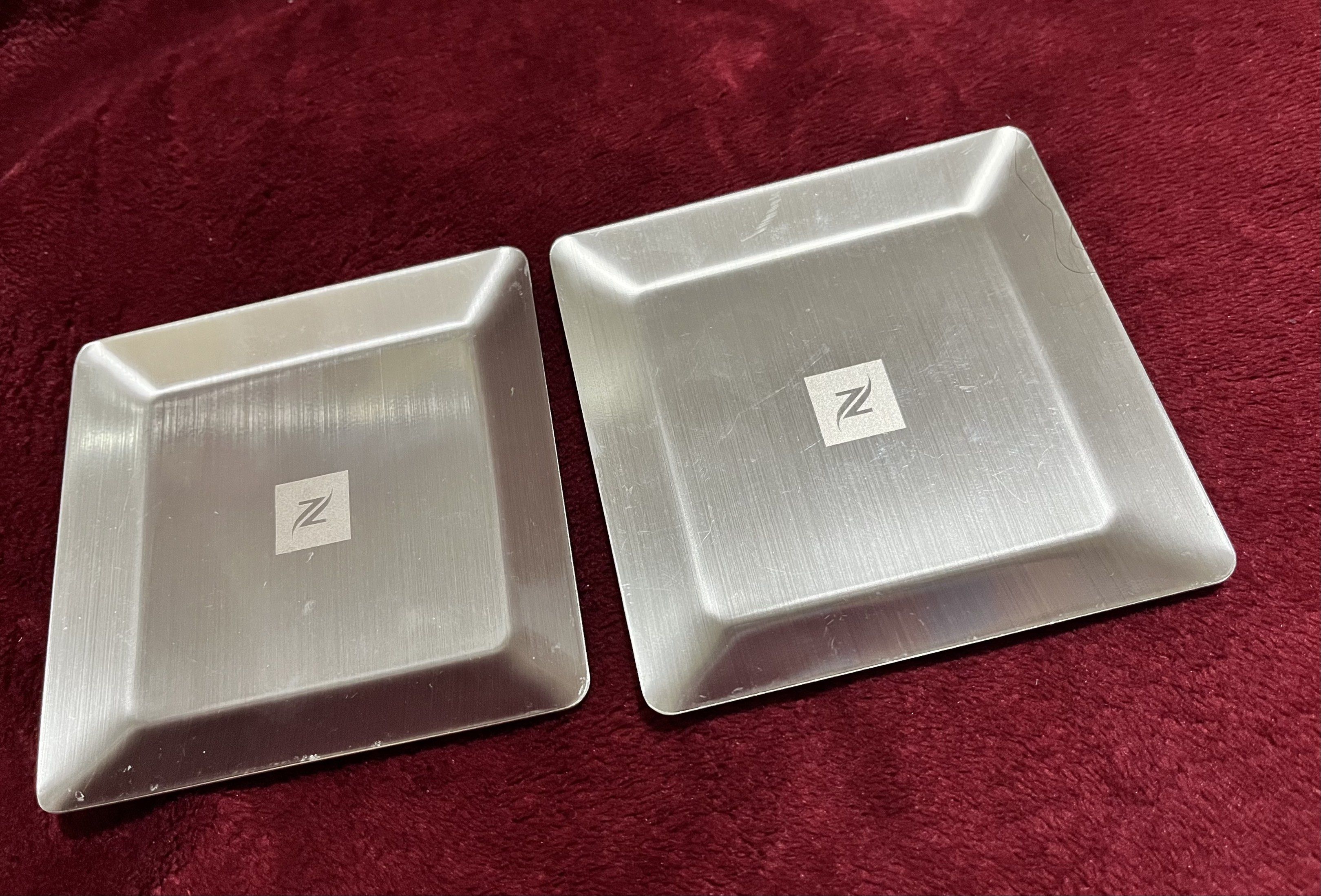 Nespresso Metal Coasters/ Small Serving Dish 2 pcs (Category: Coffee & Tea Tableware) located in La Trinidad. Submitted by whatnotcollections (Listing ID 1420285553, Image 1). Description: - Set of two Nespresso stainless steel coasters. - Features a brushed steel finish. - Showcases the Nespresso logo. - Adds a touch of elegance to your coffee setup. - Protects surfaces from spills and heat. - approximately 4” x 4” Slightly negotiable for sure b