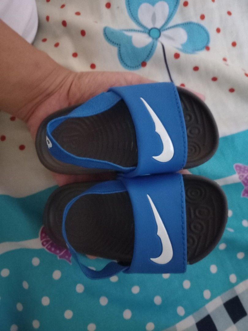 Nike Baby Sandals Blue (Category: Babies & Kids Fashion) located in Manila. Submitted by enzierose (Listing ID 1420295497, Image 3). Description: - Blue Nike baby sandals - Size 130 - Features Nike swoosh logo - Back strap for secure fit - Dark grey textured soles - Perfect for babies!.