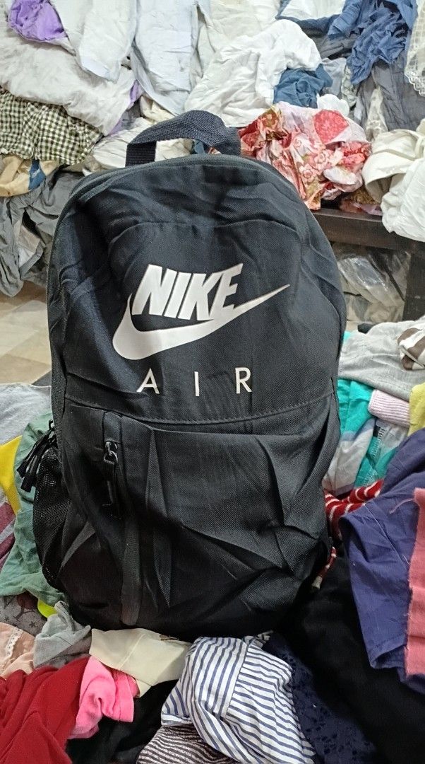 Nike Elemental Backpack (Category: Backpacks) located in Bacolod City. Submitted by cadizthrifter (Listing ID 1420209595, Image 2). Description: - Black Nike Elemental backpack - Large main compartment - Front zip pocket - Side pocket - Nike Air logo on front - Nike Air logo on the back - Made of 100% polyester.
