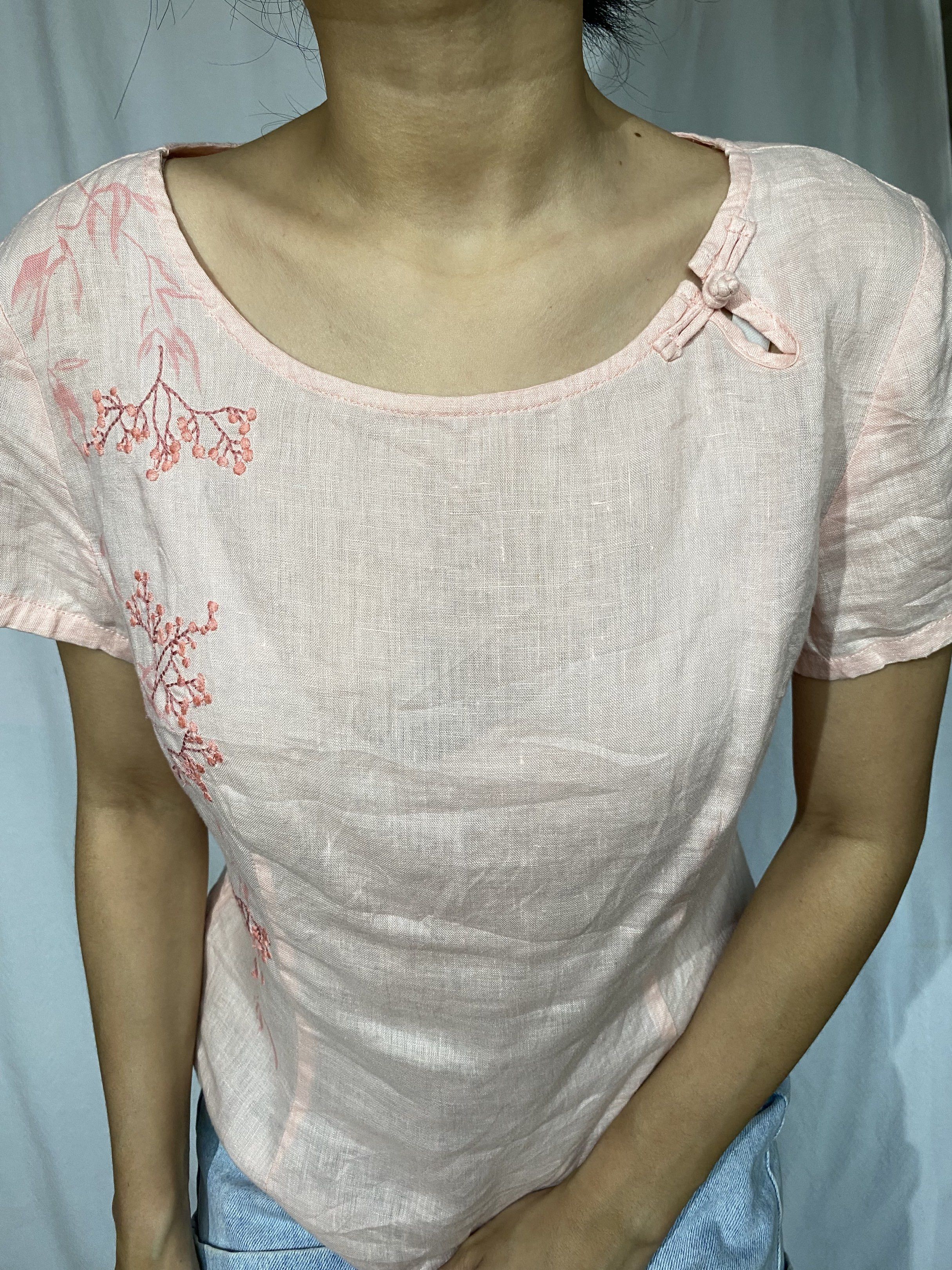 Pink Embroidered Linen Topwith chinese frog button (Category: Sleeveless) located in Tarlac. Submitted by himesells (Listing ID 1420242450, Image 3). Description: - Pink embroidered top - Short sleeves - Round neckline - Side zipper - Linen material - Features a small bow detail - Perfect for a casual, feminine look.