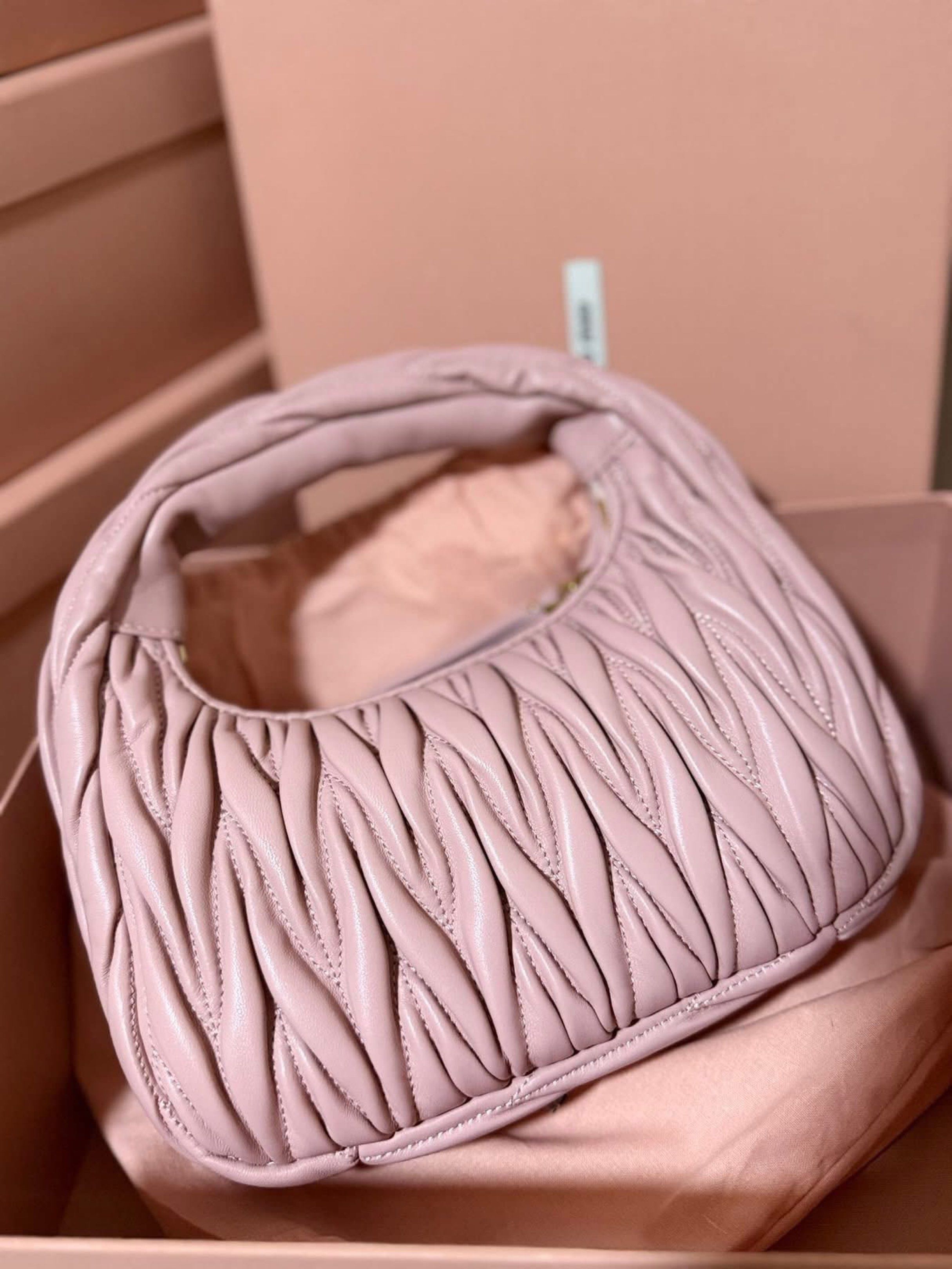 Preloved Miu Miu Wander Matelassé Hobo Bag (Category: Luxury Bags & Wallets) located in Manila. Submitted by bagsandshoesmanymore (Listing ID 1420162971, Image 3). Description: - Preloved Miu Miu Wander Matelassé Hobo Bag - Stylish shoulder bag -size 24cm - Quilted design - Top handle - Detachable shoulder strap - Gold-tone logo - Zip closure - Includes dust bag and box - Fabric lining with small pocket Please read before you order 👉🏻❗️Payment 
