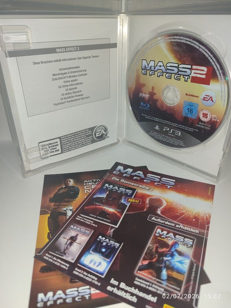 PS3 - Mass Effect 2 (PRE-LOVED) "EU" (Category: PlayStation) located in Mendez-Nunez. Submitted by sf2_gameshop (Listing ID 1420229190, Image 3). Description: PLEASE READ IMPORTANT NOTE: The text on the covert art and game manual is in German. However, the gameplay, voice and in-game text are fully in English. CONDITION: A pre-loved item, in very good condition. Tested working. Game manual and inserts are included. GENRE: Action role-playing, thi