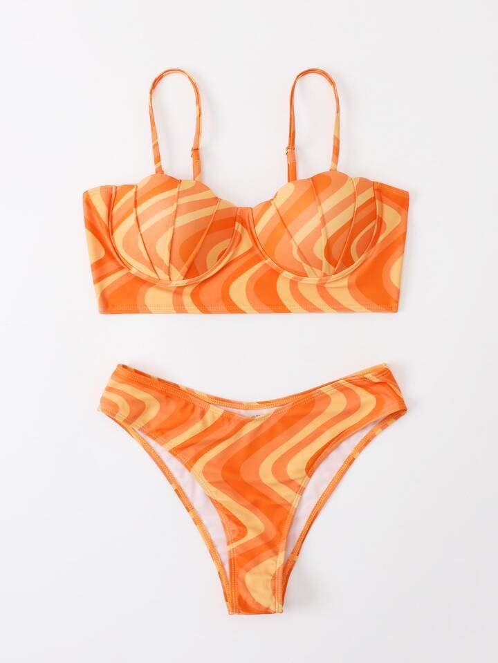 Shein Orange Allover Print Scallop Bikini Set (Category: Bikinis & Swimsuits) located in Cavite. Submitted by itsjameee (Listing ID 1420275830, Image 3). Description: - Orange swirl bikini set - Top: Adjustable straps, bustier style - Bottoms: High-cut - Some sets include a skirt with drawstring detail.