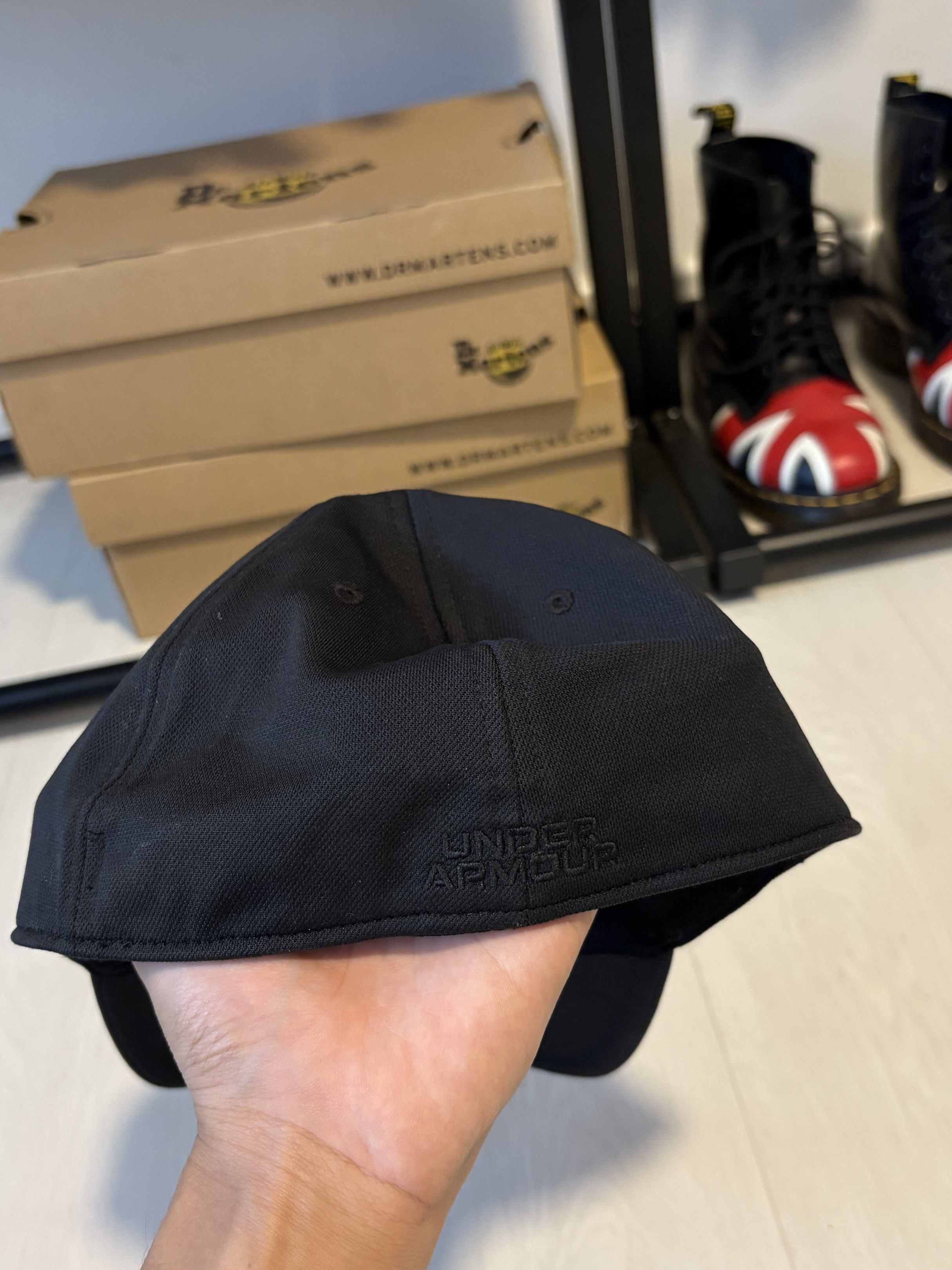Under Armour Black Cap (Category: Caps & Hats) located in Singapore. Submitted by misterhola (Listing ID 1420249668, Image 2). Description: Bought for $35 from UA Bugis Junction. Selling for $9 only. Still in good condition. Price non negotiable..