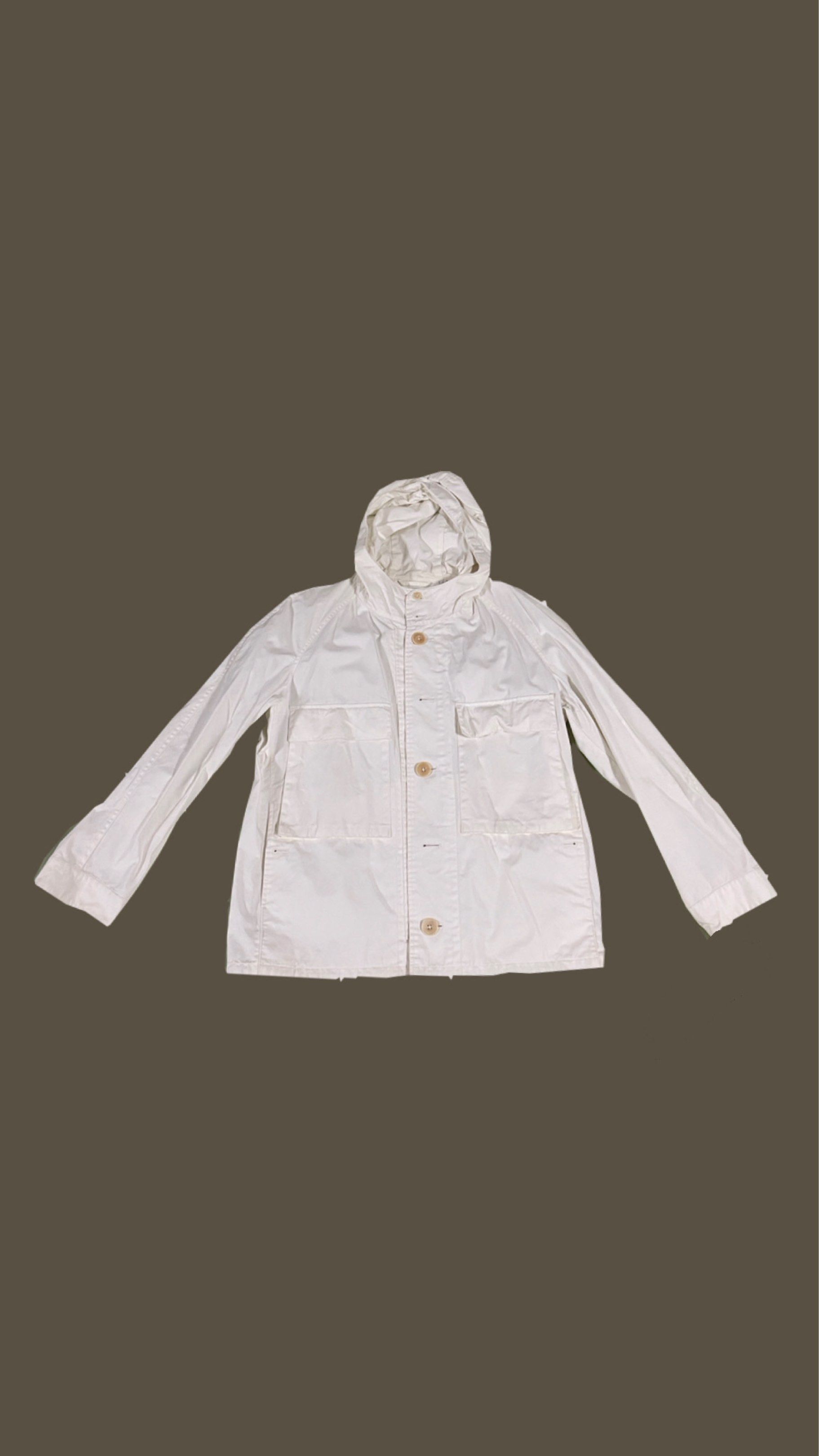 Uniqlo Lemaire White Parka (Category: Coats, Jackets and Outerwear) located in Manila. Submitted by jplav (Listing ID 1420200426, Image 1). Description: - 23x27 - before Uniqlo U was a thing - semi-water repellent material - hooded - tape inside peeling away, but doesn’t affect da lewk.