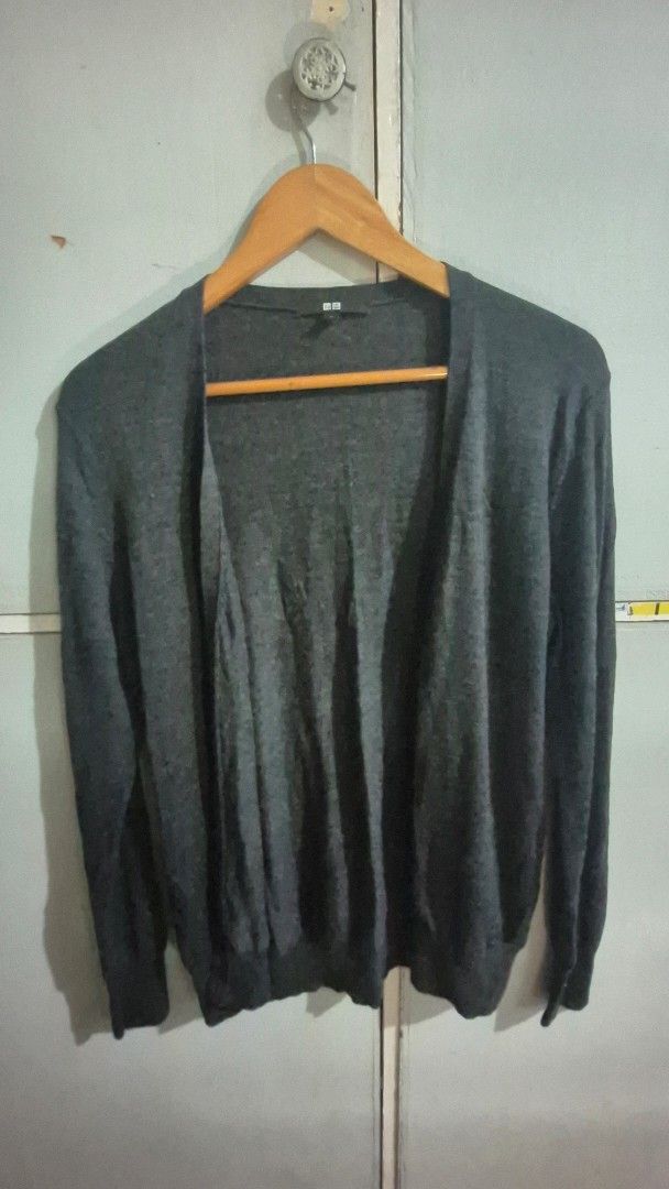 Uniqlo Wool Sweater XL (Category: Coats, Jackets and Outerwear) located in Manila. Submitted by declutter_s (Listing ID 1420297174, Image 2). Description: - Uniqlo wool sweater - Color: Dark grey - Features button detail - Size: XL (Bust 92-98 cm, 165/92A) - Material: 100% wool - Made in China.