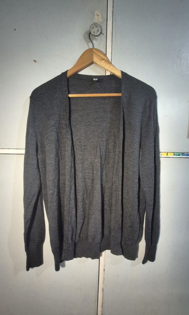 Uniqlo Wool Sweater XL (Category: Coats, Jackets and Outerwear) located in Manila. Submitted by declutter_s (Listing ID 1420297174, Image 1). Description: - Uniqlo wool sweater - Color: Dark grey - Features button detail - Size: XL (Bust 92-98 cm, 165/92A) - Material: 100% wool - Made in China.