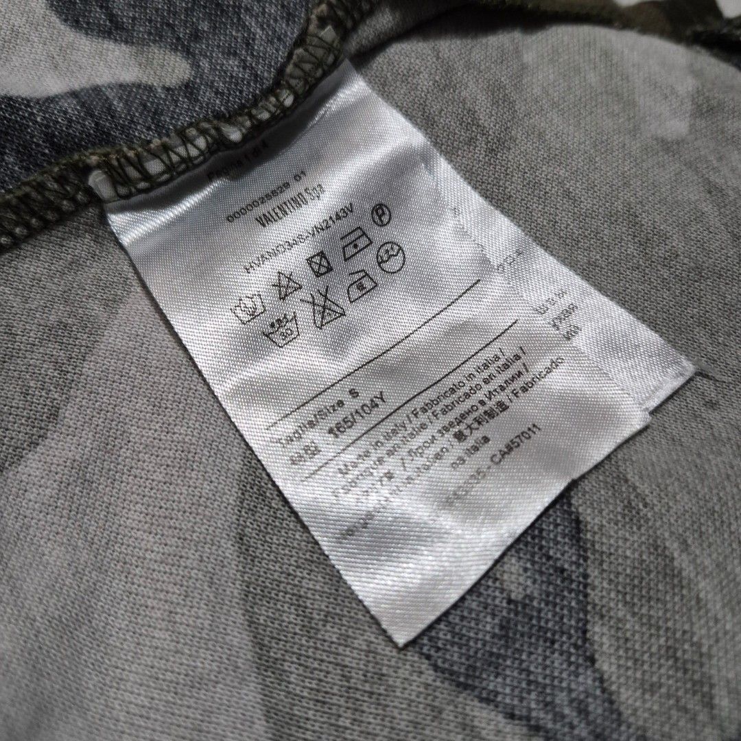 VALENTINO ROCKSTUD CAMO POLO SHIRT (Category: Tshirts & Polo Shirts ) located in Manila. Submitted by mkalelx (Listing ID 1420228295, Image 3). Description: FOR SALE: VALENTINO ROCKSTUD CAMO POLO SHIRT •1,500PHP •Authentic •Size: Small •W: 20 •L: 24 •Color Rate: 9.5/10 •No major flaw •Location: Antipolo •Meetup: Robinsons Antipolo •Can ship via LBC, Lalamove, J&T. •Buyer shoulders the shipping fee. •Condition: This previously owned and used item 