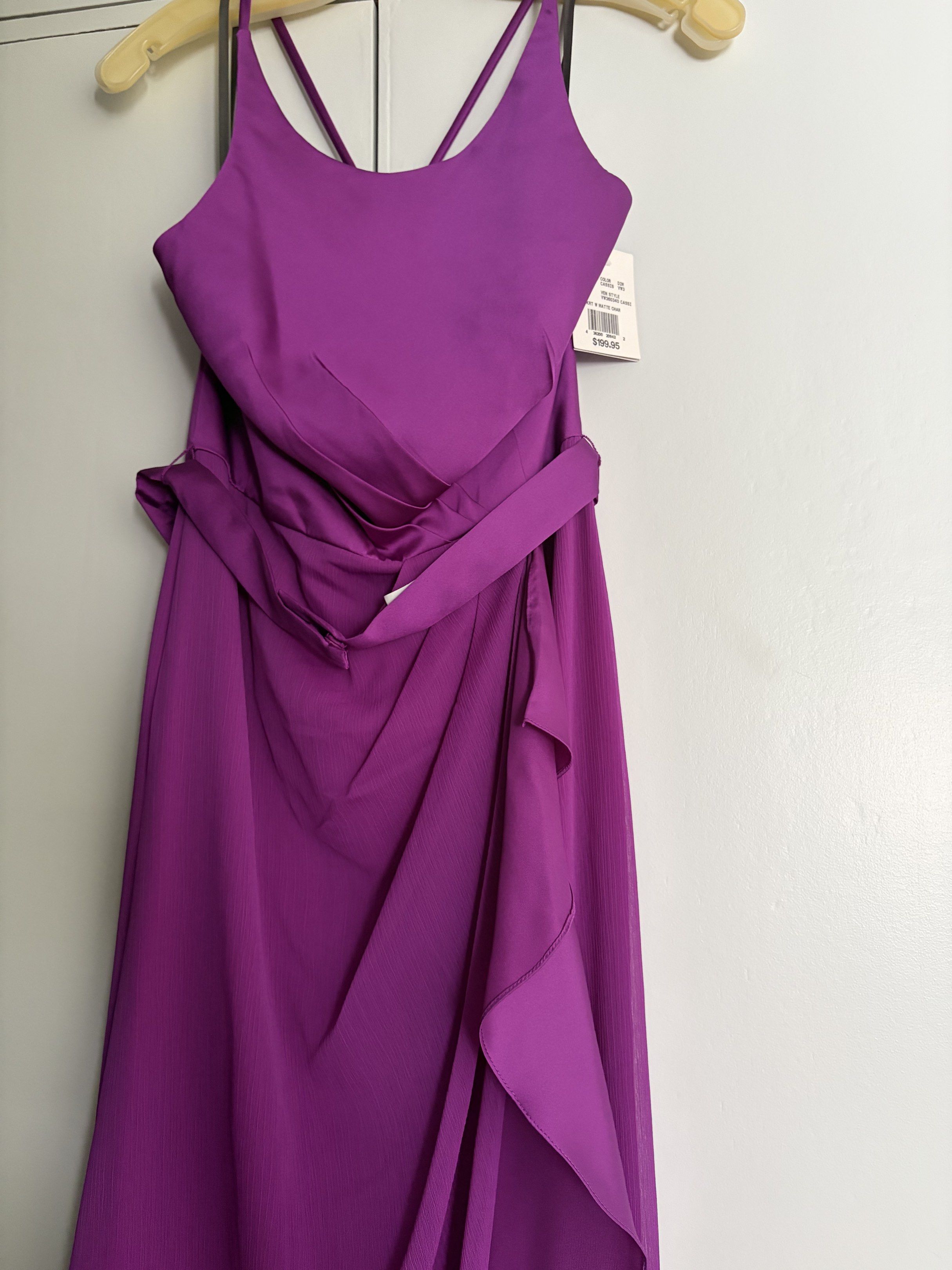 White by Vera Wang Purple Gown (Category: Evening dresses & gowns) located in Makati City. Submitted by lenyfelix (Listing ID 1420224958, Image 3). Description: - White by Vera Wang purple gown - Size 6 - Flattering draped design - Wrap-around waist detail - Flowing, floor-length skirt - Criss-cross back - Includes original tags.