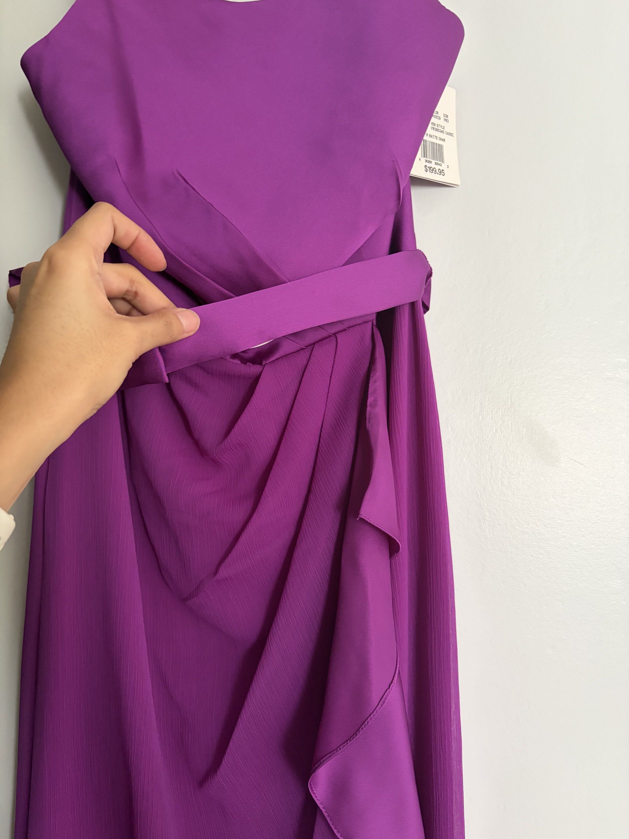 White by Vera Wang Purple Gown (Category: Evening dresses & gowns) located in Makati City. Submitted by lenyfelix (Listing ID 1420224958, Image 2). Description: - White by Vera Wang purple gown - Size 6 - Flattering draped design - Wrap-around waist detail - Flowing, floor-length skirt - Criss-cross back - Includes original tags.
