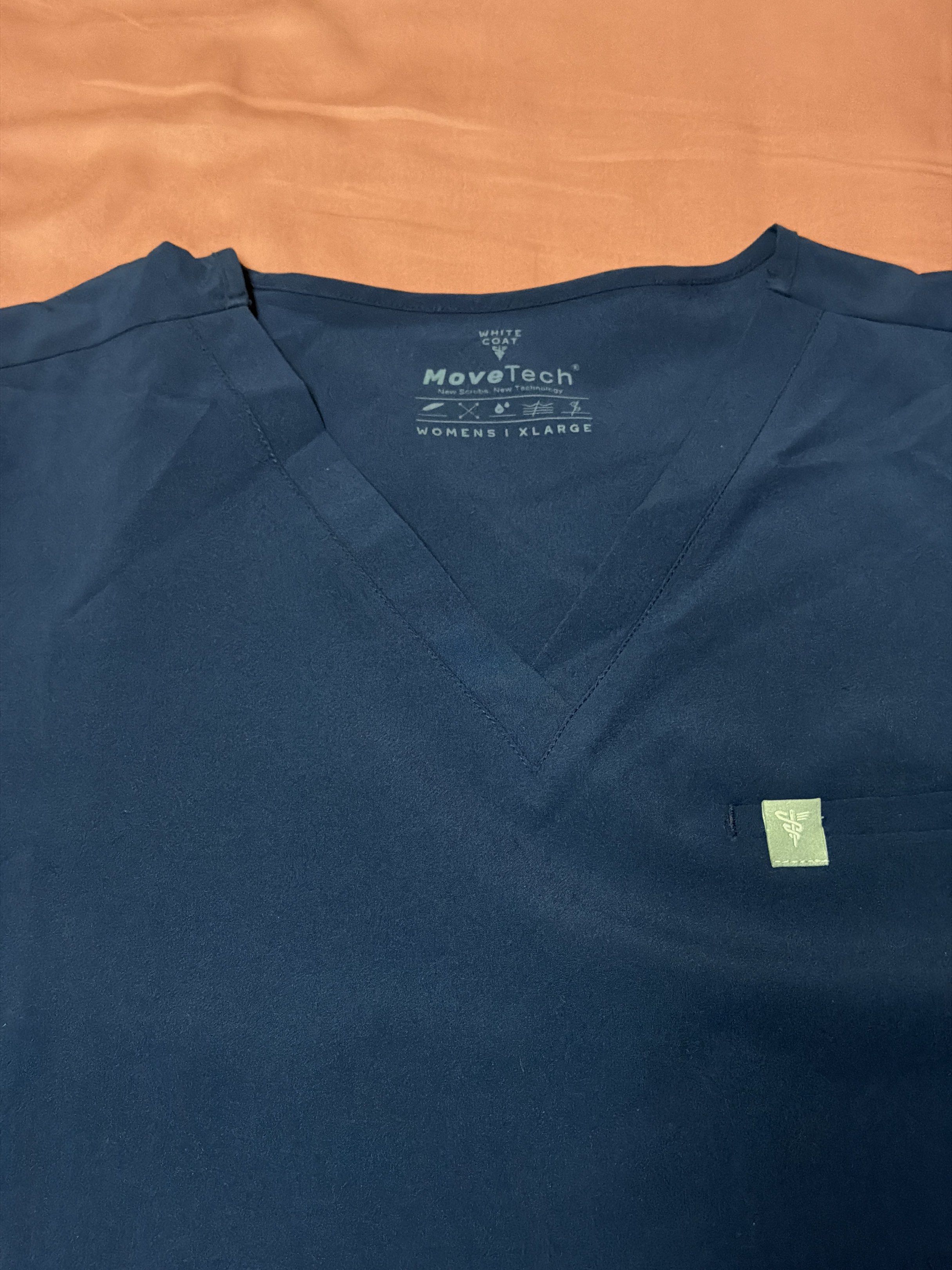 White coat manila scrubs top (Category: Shirts) located in Manila. Submitted by thmbl95 (Listing ID 1373632351, Image 2). Description: ₱1300 White coat manila scrub top navy 5 pockets XL Brand new without tags Width 22in Length 27in.