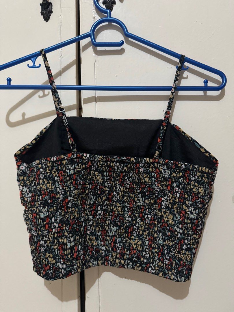 Zalora Basics Floral Crop Top (Category: Others Tops) located in Quezon City. Submitted by brandsetcph (Listing ID 1420303110, Image 3). Description: - Lorb Basics Floral Crop Top - Size: M - Design: Square neckline, adjustable straps, ruched front - Comfort: Smocked back for a flexible fit - Pattern: Colorful floral print on a black background.