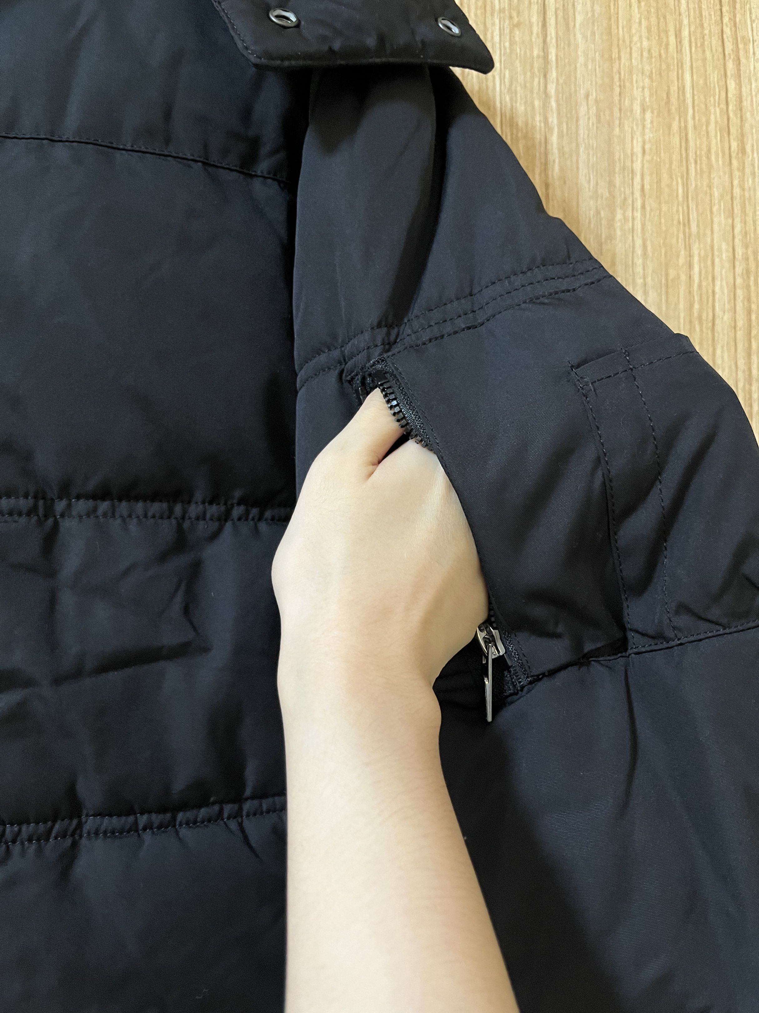 Zara Man Black Puffer Jacket (Category: Coats, Jackets and Outerwear) located in Taguig. Submitted by kdf13 (Listing ID 1420284105, Image 3). Description: - Zara Man black puffer jacket - Size: M (EUR) - Features: - High collar - Hood - Multiple pockets (including sleeve zipper pocket) - Button and zipper closure - Interior lined with dark blue fabric - Made in Vietnamy - Can be used by women too - No issues - Very warm RFS: Decluttering Lowballe