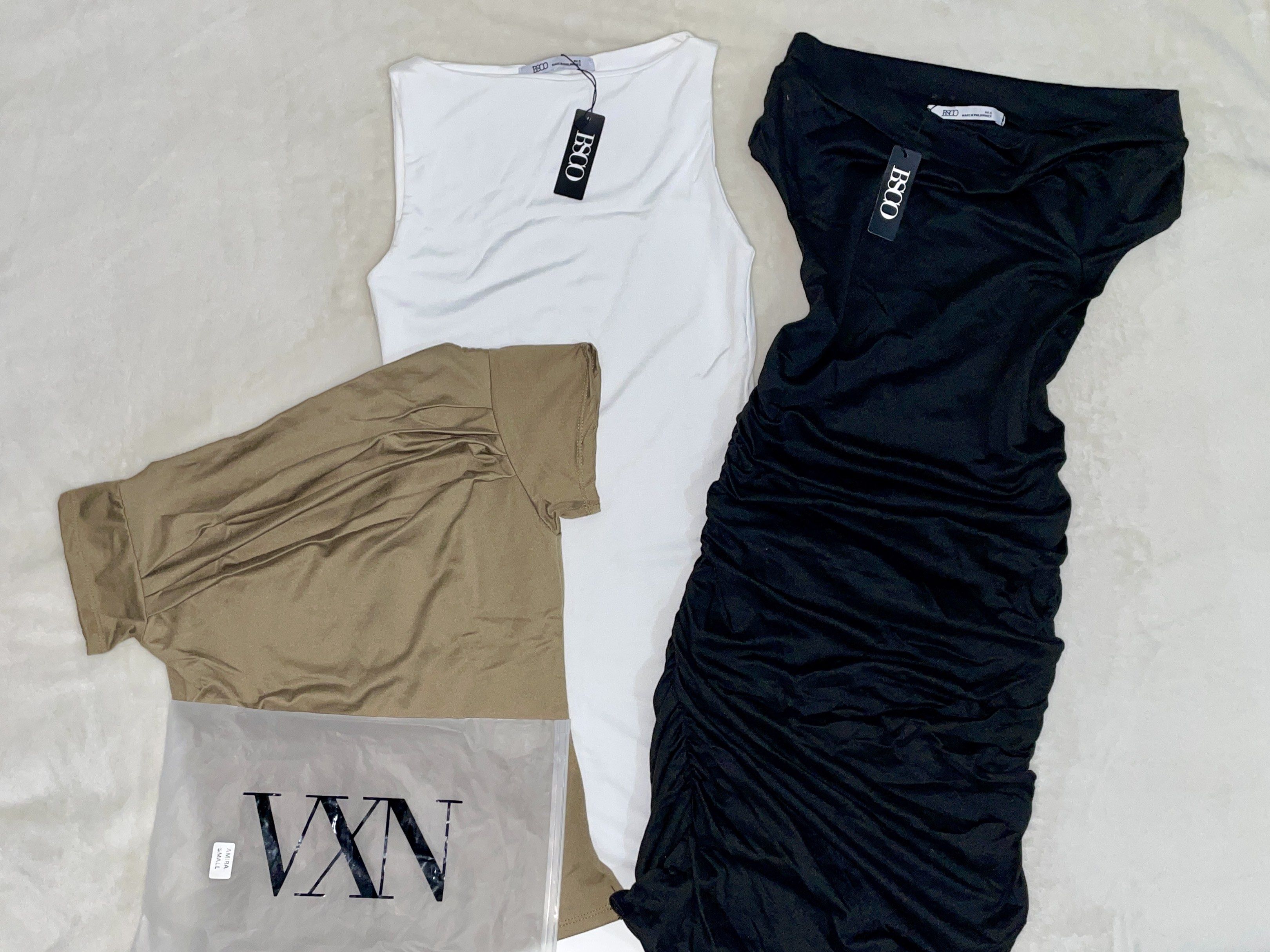 ( TAKE ALL ) VXN Top and BSCO Dresses (Category: Dresses) located in Valenzuela. Submitted by lovedbyheli (Listing ID 1420505513, Image 1). Description: All items are brand new with tags 🤍 Includes: - Black off-shoulder dress with ruched detailing - White sleeveless dress - Brown top 💰 Mode of Payment (MOP): GCash 📦 Mode of Delivery (MOD): - Lalamove (Same-day delivery) - J&T Express (1-3 days) - Shipping fee is to be shouldered by the buyer. 