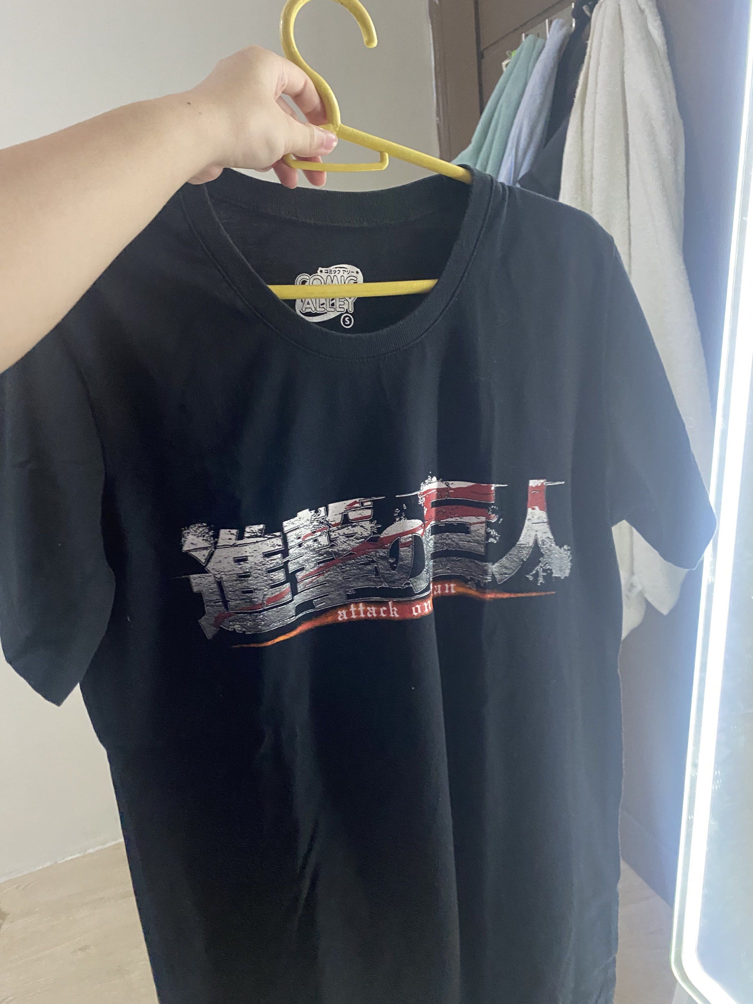 Attack on Titan Black T-shirt (Category: Tshirts & Polo Shirts ) located in Caloocan City. Submitted by krokak (Listing ID 1420475541, Image 1). Description: - Attack on Titan t-shirt - Size: S - Design: Attack on Titan logo on front, Survey Corps emblem on back - Style: Round neck, short sleeves.
