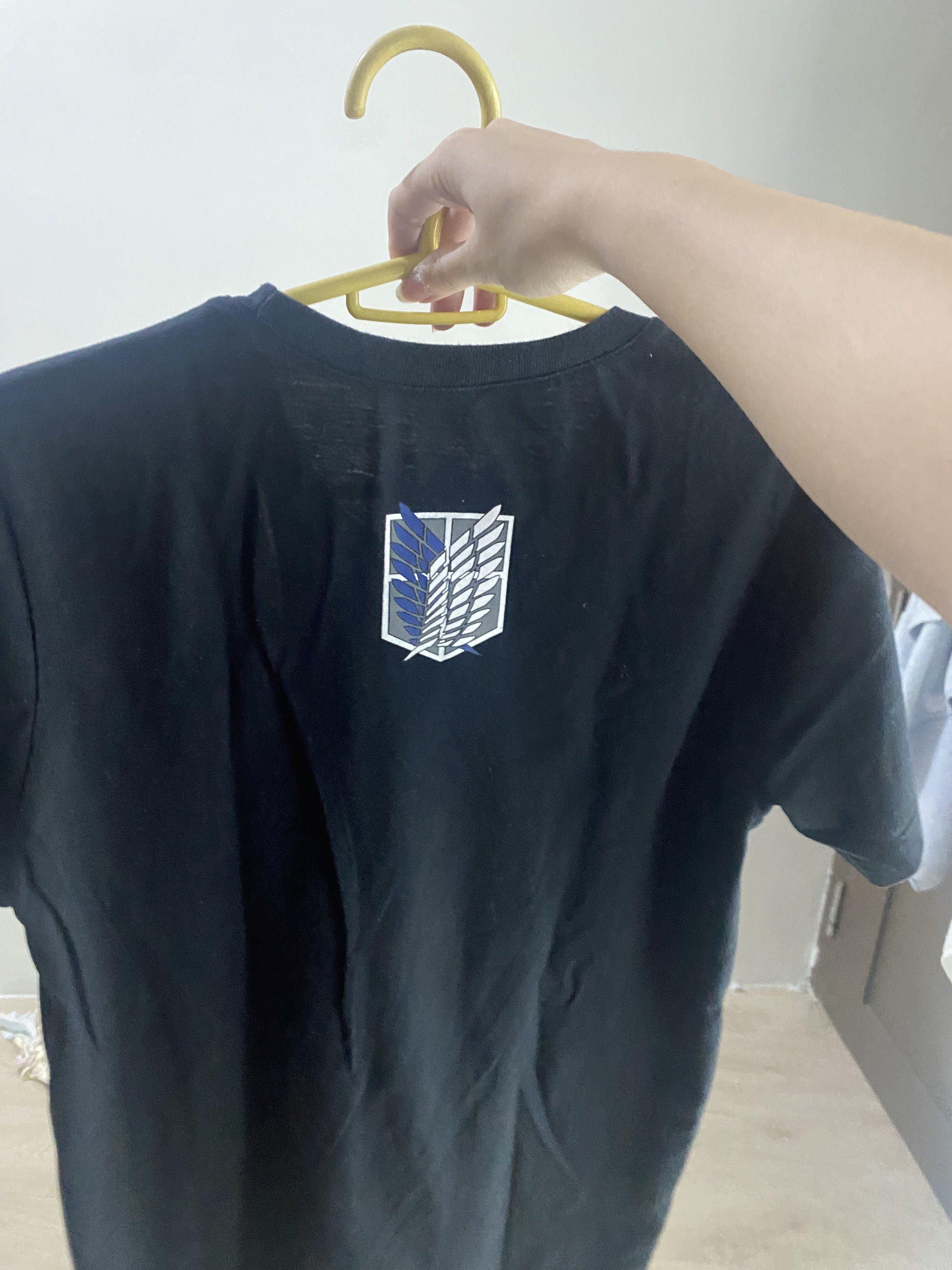 Attack on Titan Black T-shirt (Category: Tshirts & Polo Shirts ) located in Caloocan City. Submitted by krokak (Listing ID 1420475541, Image 3). Description: - Attack on Titan t-shirt - Size: S - Design: Attack on Titan logo on front, Survey Corps emblem on back - Style: Round neck, short sleeves.