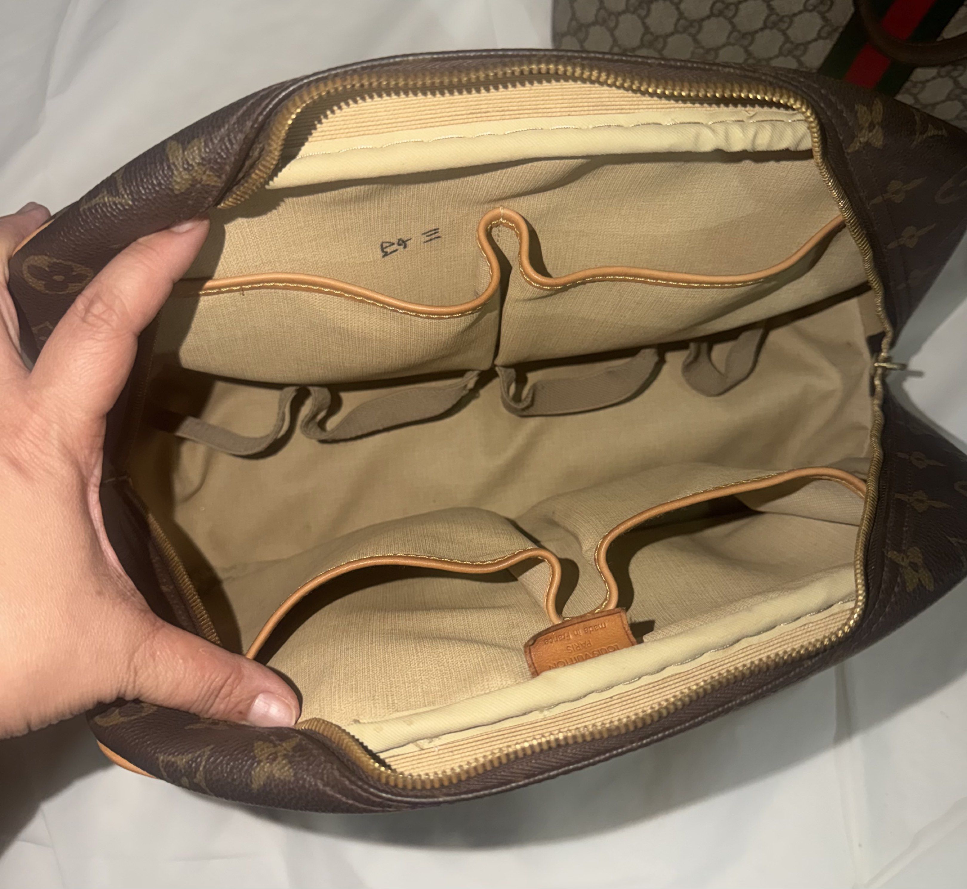 Authentic LV DEAUVILLE CAV - Louis Vuitton Bag (Category: Luxury Bags & Wallets) located in Quezon City. Submitted by hpygoods (Listing ID 1420423997, Image 3). Description: Authentic Louis Vuitton Deauville handbag - CAV - Changed all Vachetta using original untreated Vachetta Leather made by a reputable store - Iconic monogram canvas - still in very good condition - Med-Large sized bag - Leather trim and handles - Multiple interior compartments
