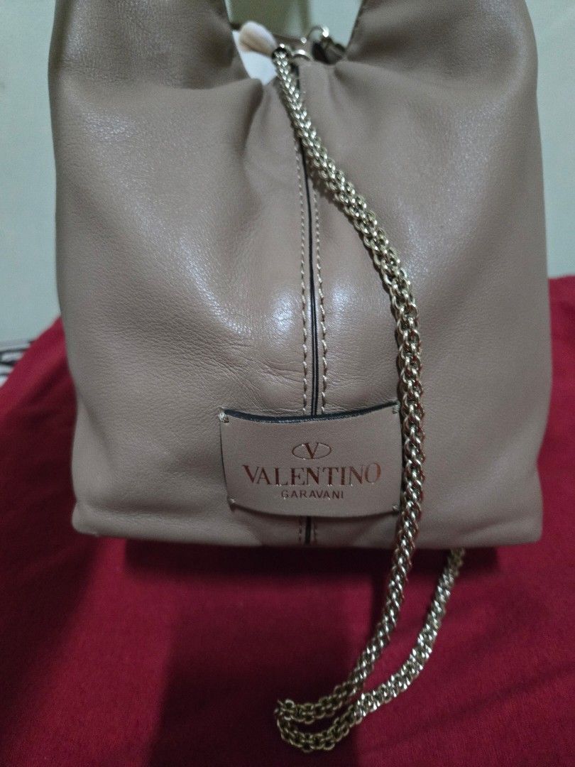 Authentic Valentino Stud Bag (Category: Luxury Bags & Wallets) located in Cebu City. Submitted by misshaada (Listing ID 1420426273, Image 2). Description: RFS: decluttering with dustbag with care cards authentic.