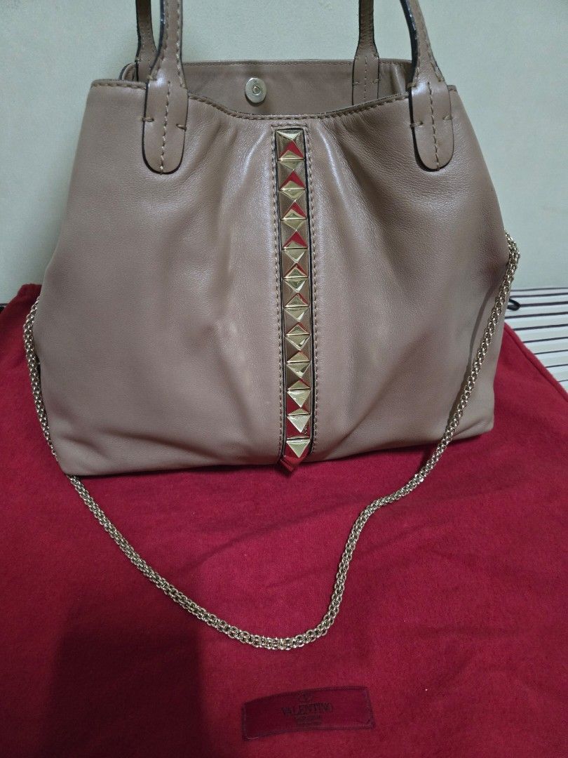 Authentic Valentino Stud Bag (Category: Luxury Bags & Wallets) located in Cebu City. Submitted by misshaada (Listing ID 1420426273, Image 1). Description: RFS: decluttering with dustbag with care cards authentic.