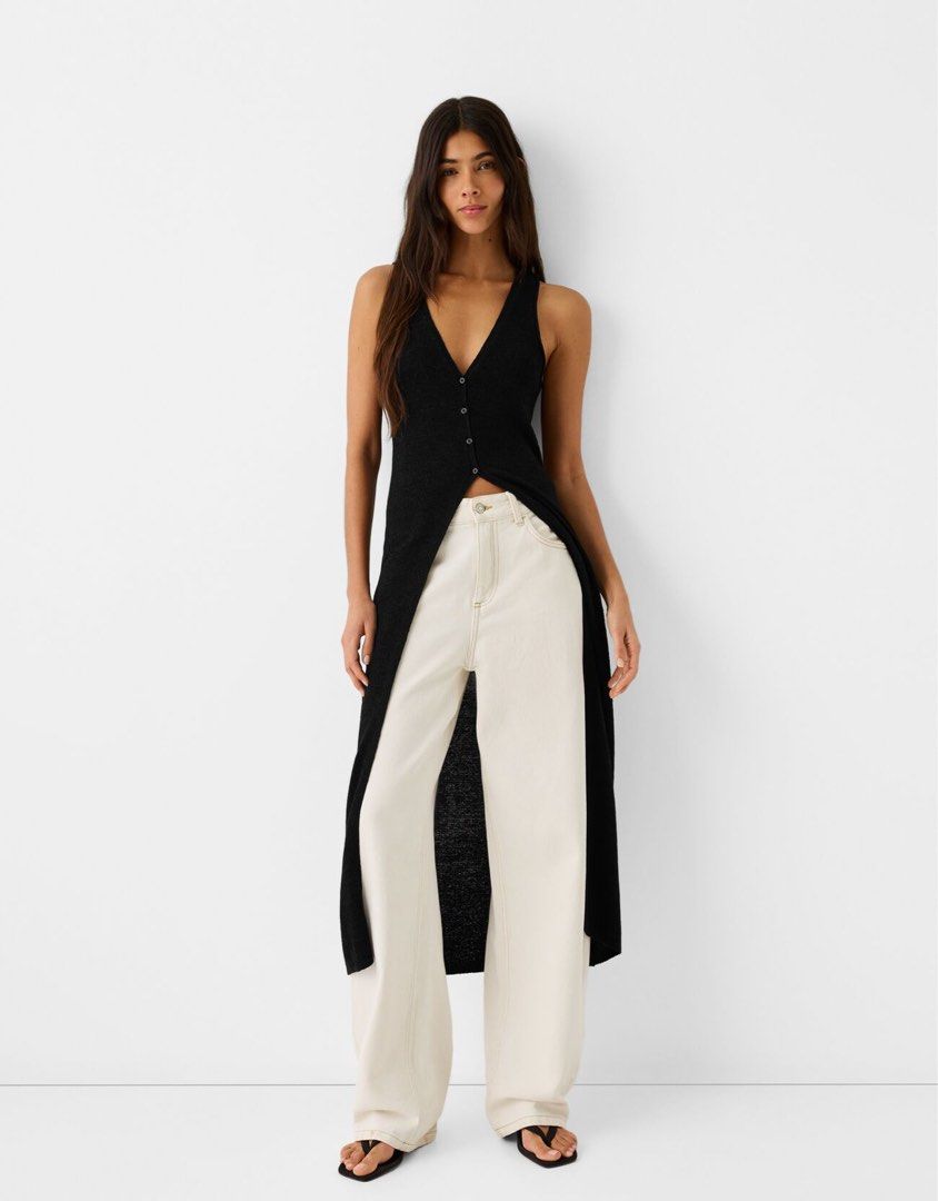 Bershka Long Buttoned Knitwear Top (Category: Sleeveless) located in Makati City. Submitted by sixelaa (Listing ID 1420412347, Image 3). Description: Worn once Size - XS RFS: decluttering.