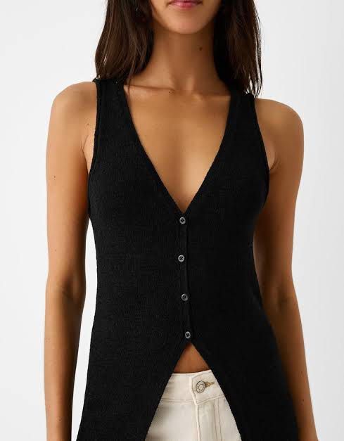 Bershka Long Buttoned Knitwear Top (Category: Sleeveless) located in Makati City. Submitted by sixelaa (Listing ID 1420412347, Image 2). Description: Worn once Size - XS RFS: decluttering.