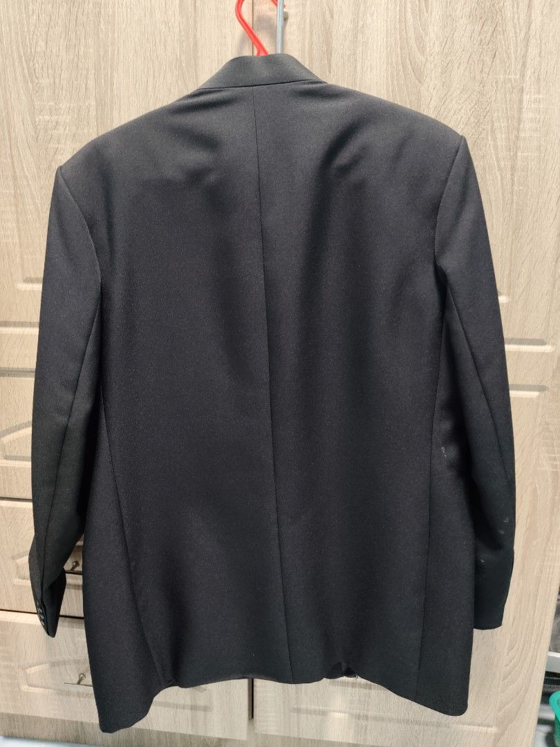 Black Blazer (Category: Coats, Jackets and Outerwear) located in Rizal. Submitted by _cess_ (Listing ID 1420444807, Image 2). Description: - Black blazer - Chinese collar - Two front pockets and one chest pocket - Two-button closure - Single vent at the back - Buttoned cuffs.