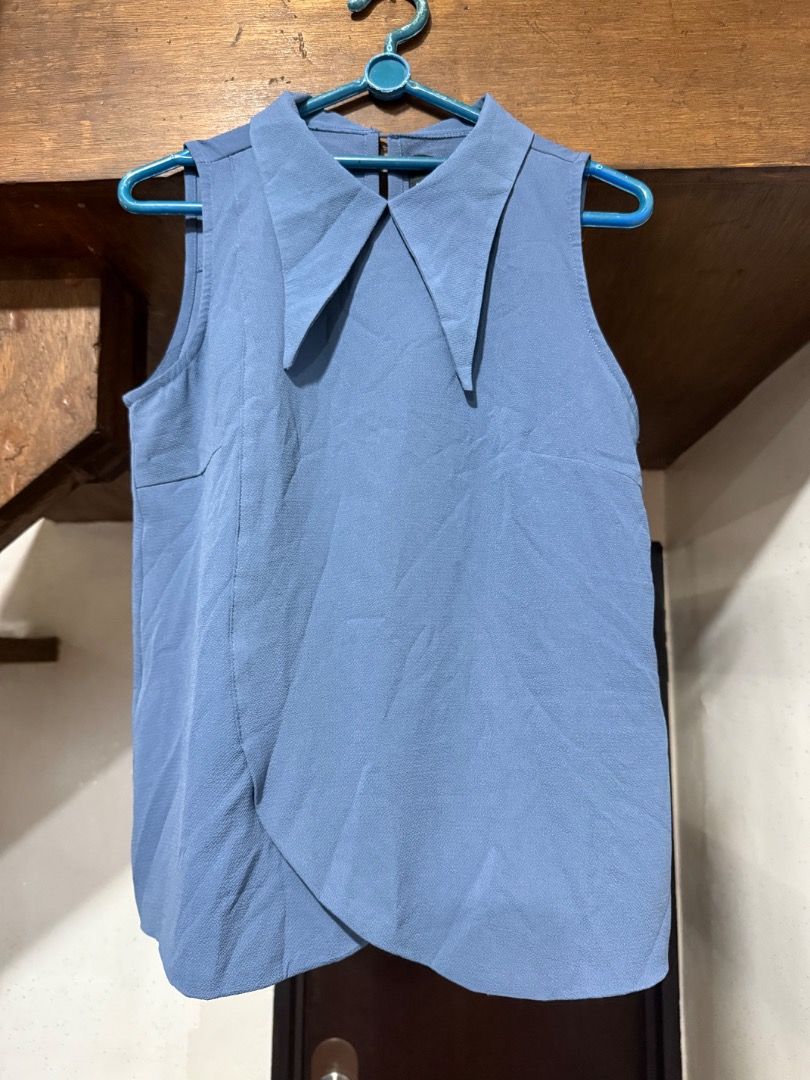 Blue sleeveless top (Category: Sleeveless) located in Paranaque City. Submitted by 10001thingstodeclutter (Listing ID 1420486170, Image 1). Description: .