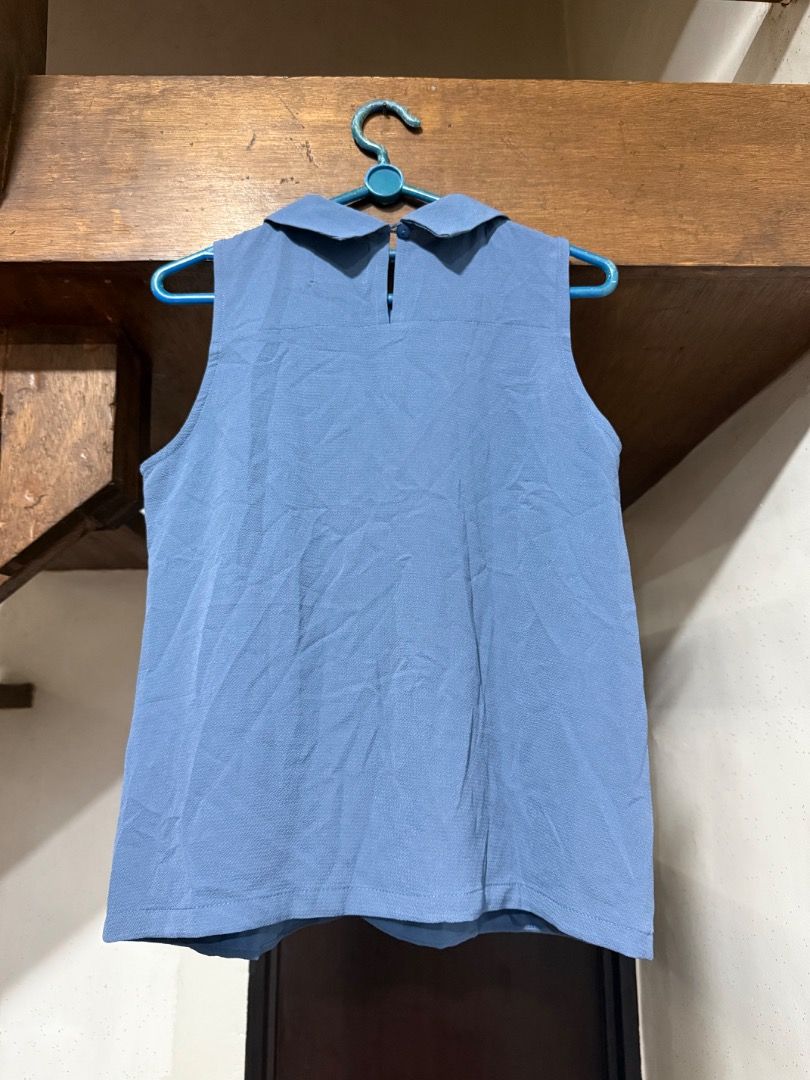 Blue sleeveless top (Category: Sleeveless) located in Paranaque City. Submitted by 10001thingstodeclutter (Listing ID 1420486170, Image 2). Description: .