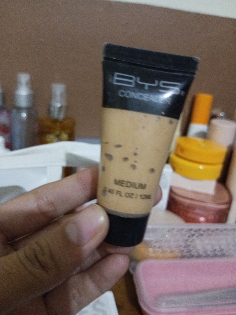 BYS Concealer - Medium (Category: Makeup) located in Kabankalan. Submitted by jayejaye29 (Listing ID 1420540856, Image 1). Description: - BYS Concealer in Medium shade - Size: 0.40 FL OZ / 12mL - Comes in a squeeze tube with a black cap - Medium skin tone color - Tube has some spots.