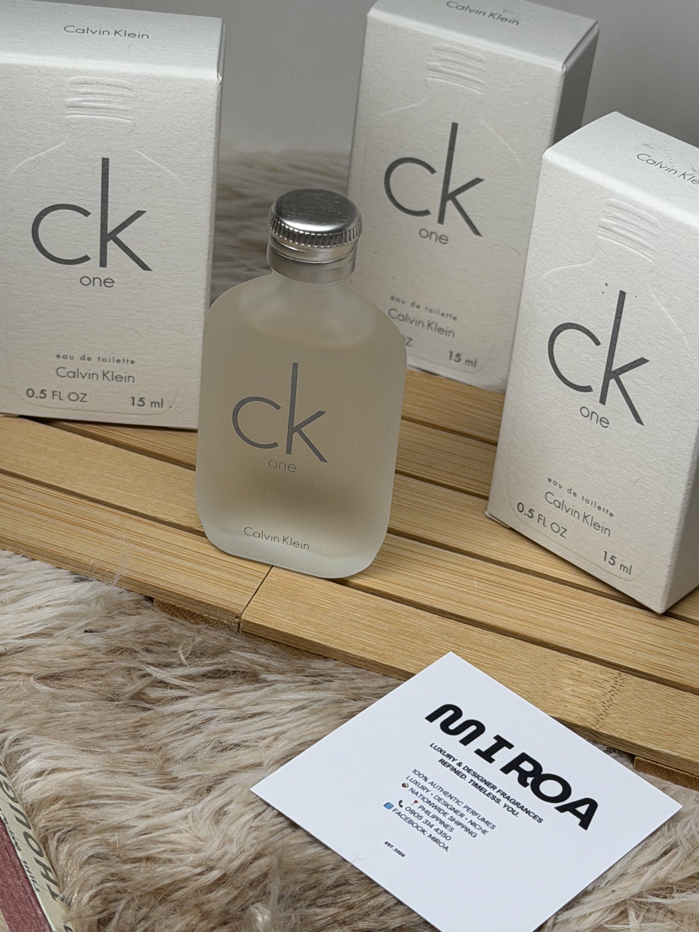 Calvin Klein CK One Eau de Toilette 15ml (Category: Fragrance & Deodorants) located in Manila. Submitted by jafelizarte (Listing ID 1420548816, Image 3). Description: - Authentic Calvin Klein CK One Eau de Toilette - 15ml bottle included - Original packaging included - Fresh and clean fragrance - Ideal for everyday wear - Great for travel or as a gift - Sourced from MIROA, a luxury fragrance retailer.