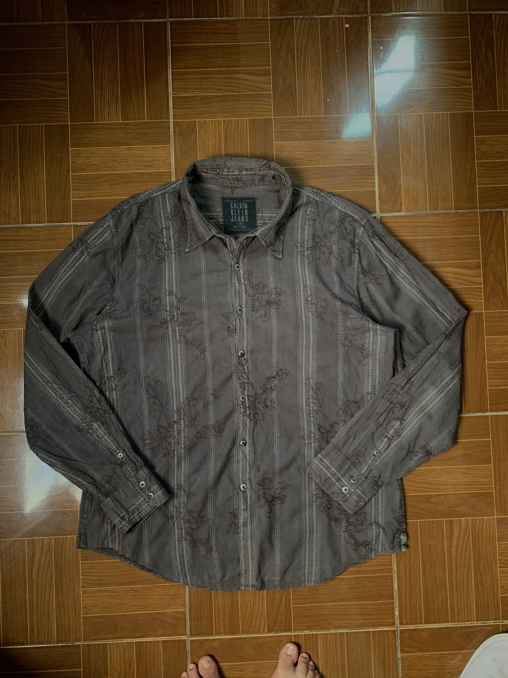 Calvin Klein Jeans Long Sleeve Polo (Category: Tshirts & Polo Shirts ) located in Cebu City. Submitted by recypparel (Listing ID 1420467601, Image 1). Description: Calvin Klein Jean Long Sleeve Polo no issue, in great condition size XL W-24 L-31.