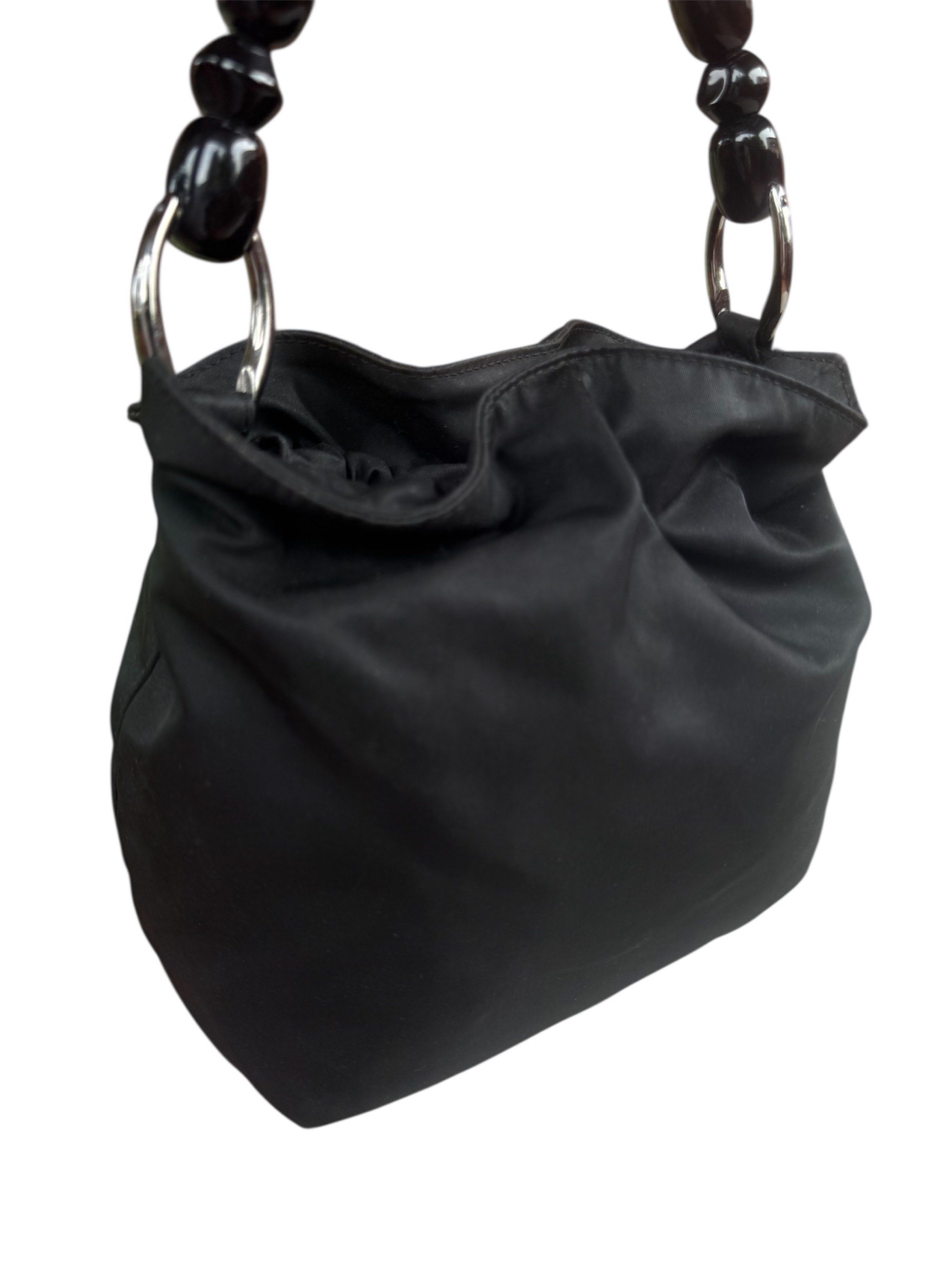 Christian Dior Black Beaded Handle Bag (Category: Luxury Bags & Wallets) located in Lingayen. Submitted by lux_thrift (Listing ID 1420409344, Image 2). Description: SALE!!! rare nylon vintage approximately 20x22x7 cm with magnetic lock has some minor scuffs no inclusion but will give provided dustbag.