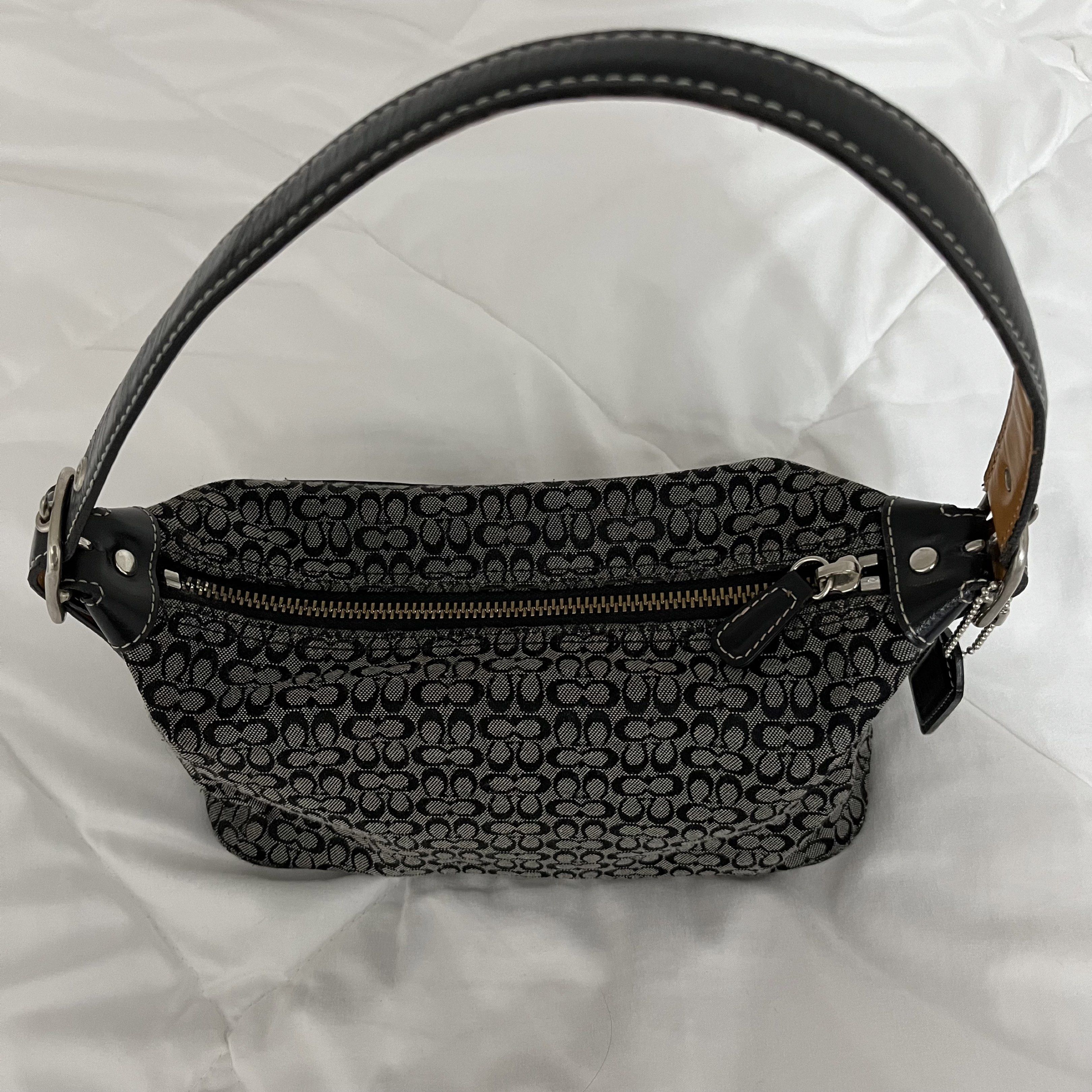 Coach Signature Shoulder Bag (Category: Luxury Bags & Wallets) located in Manila. Submitted by loliscloset (Listing ID 1420424426, Image 3). Description: - classic black/grey coach signature monogram canvas - silver-tone hardware - minor fraying on the bottom edge (barely noticeable) - interior and hardware still in nice shape - good condition no when-worn photos strictly no returns or refunds no cod payment: gcash courier: j&t or spx (sf shoulde