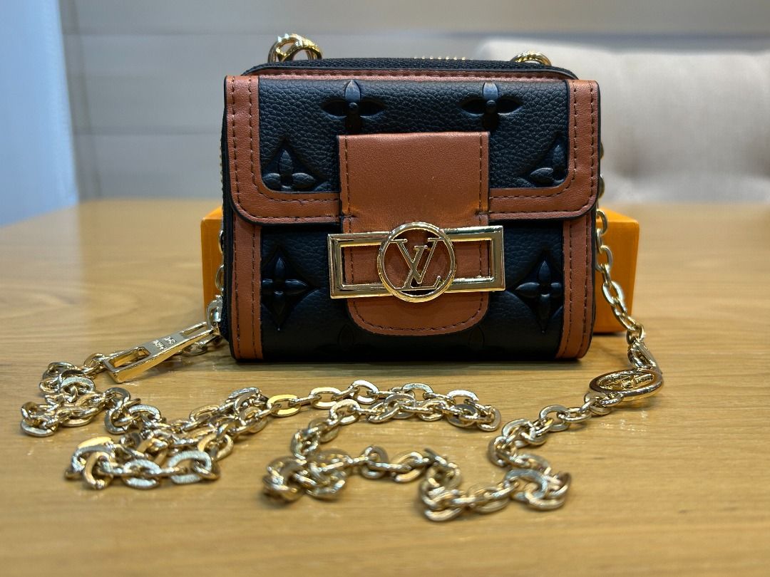 Designer Mini Square Coin Purse with Chain #2 (Category: Wallets & Card holders) located in Cebu City. Submitted by smartvogue (Listing ID 1420392938, Image 3). Description: - Black and brown color scheme - Gold-tone hardware - Features a chain strap - Secure zip closure - Black interior with Louis Vuitton Paris Made in France stamp - Includes box, dust bag, and paperwork - Dimensions: 3.75” H x 4.5” W - First piece already sold - Second photo fo