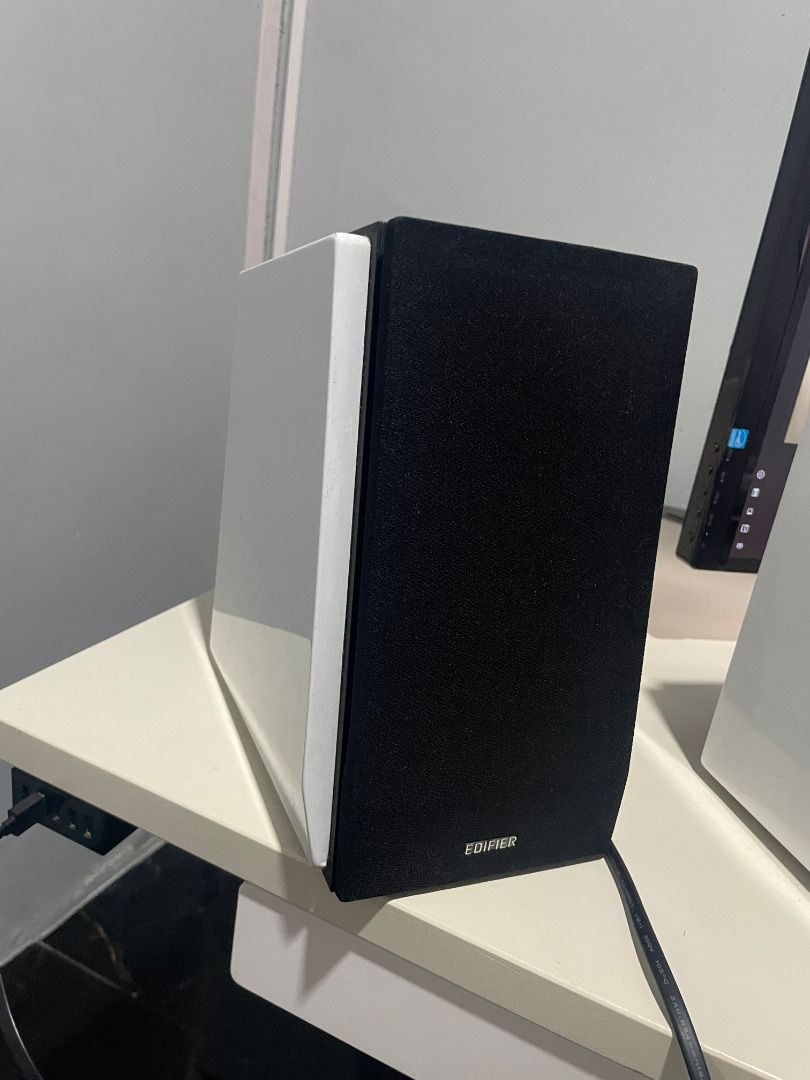 Edifier R1850DB Multimedia Speaker (Category: Soundbars, Speakers & Amplifiers) located in Valenzuela. Submitted by blitz090 (Listing ID 1420353945, Image 1). Description: - Edifier R1850DB Multimedia Speakers - Piano black finish wrapped in white vinyl. Practically no scratch on original finish - Includes remote control - Adjustable Treble, Bass, and Volume - Input Options: 2xRCA (Aux and PC), Coaxial, Optical, Bluetooth - Subwoofer Output - Hon