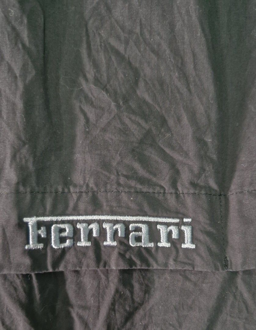Ferrari jacket (Category: Coats, Jackets and Outerwear) located in Pili. Submitted by the_g_thrift (Listing ID 1420410100, Image 3). Description: ferrari jacket large on tag dimes: 25 x 28 very good condition not fade sa ilaw lang 9up/10 color rate issue: tinanggal pockable hood nya di halata tago naman sya .