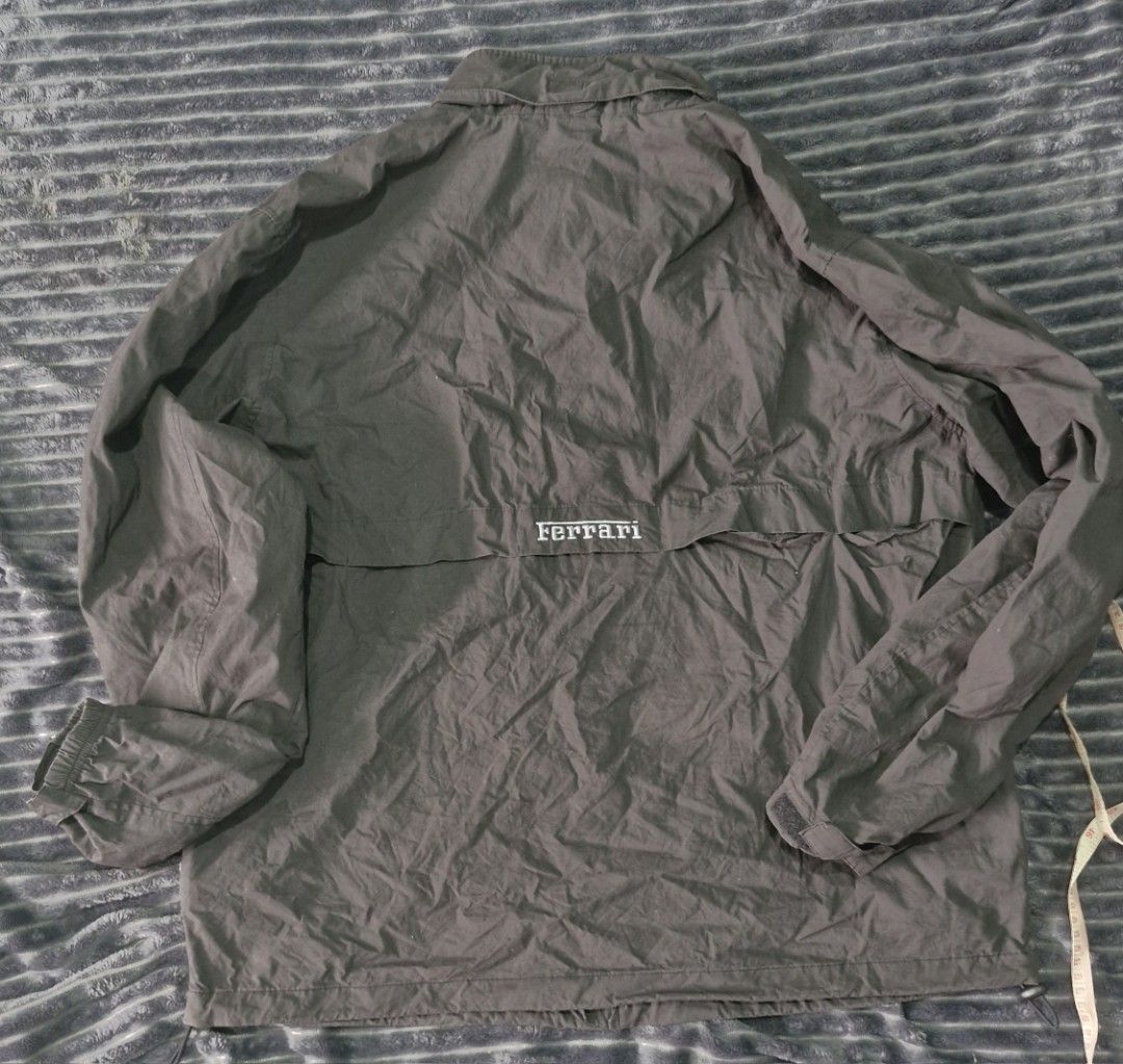 Ferrari jacket (Category: Coats, Jackets and Outerwear) located in Pili. Submitted by the_g_thrift (Listing ID 1420410100, Image 2). Description: ferrari jacket large on tag dimes: 25 x 28 very good condition not fade sa ilaw lang 9up/10 color rate issue: tinanggal pockable hood nya di halata tago naman sya .