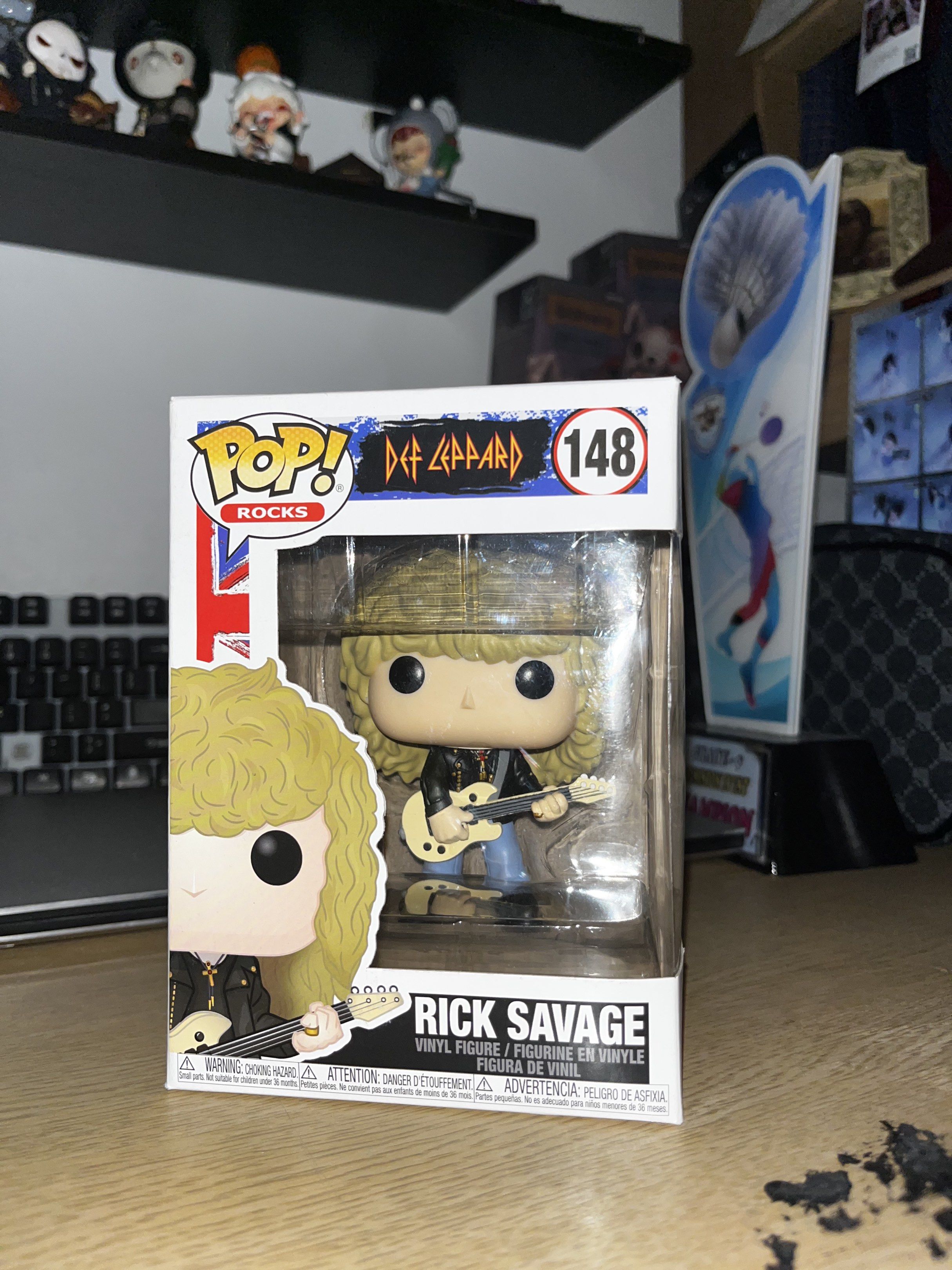 Funko Pop! Rocks Def Leppard Rick Savage #148 (Category: Figurines & Statues) located in Manila. Submitted by rshaw_ (Listing ID 1420417977, Image 2). Description: - Funko Pop! Rocks figure of Rick Savage from Def Leppard. - Part of the Pop! Rocks series (Number 148). - Figure is brand new and in its original packaging. - Box features the Funko Pop! logo and Def Leppard branding. - Rick Savage figure is holding a guitar. 📍Malabon 🚚 Lalamove/Mee