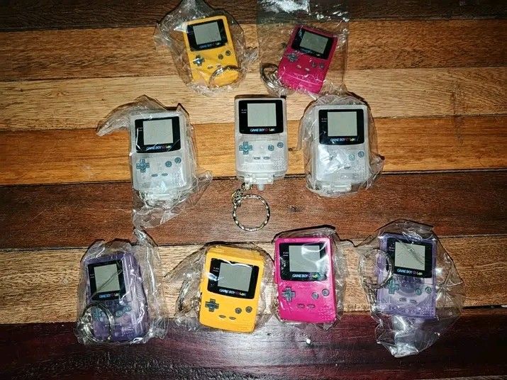gameboy color assorted keychain (Category: Nintendo) located in San Jose del Monte. Submitted by toys.merch.electronic (Listing ID 1420392008, Image 1). Description: yellow /pink (upper) pop up magnifying glass clear middle (stapler) assorted mix color (lower) tape measure 500 each 900 for 2pcs mop gcash mod flash/jnt loc sjdm bulacan.