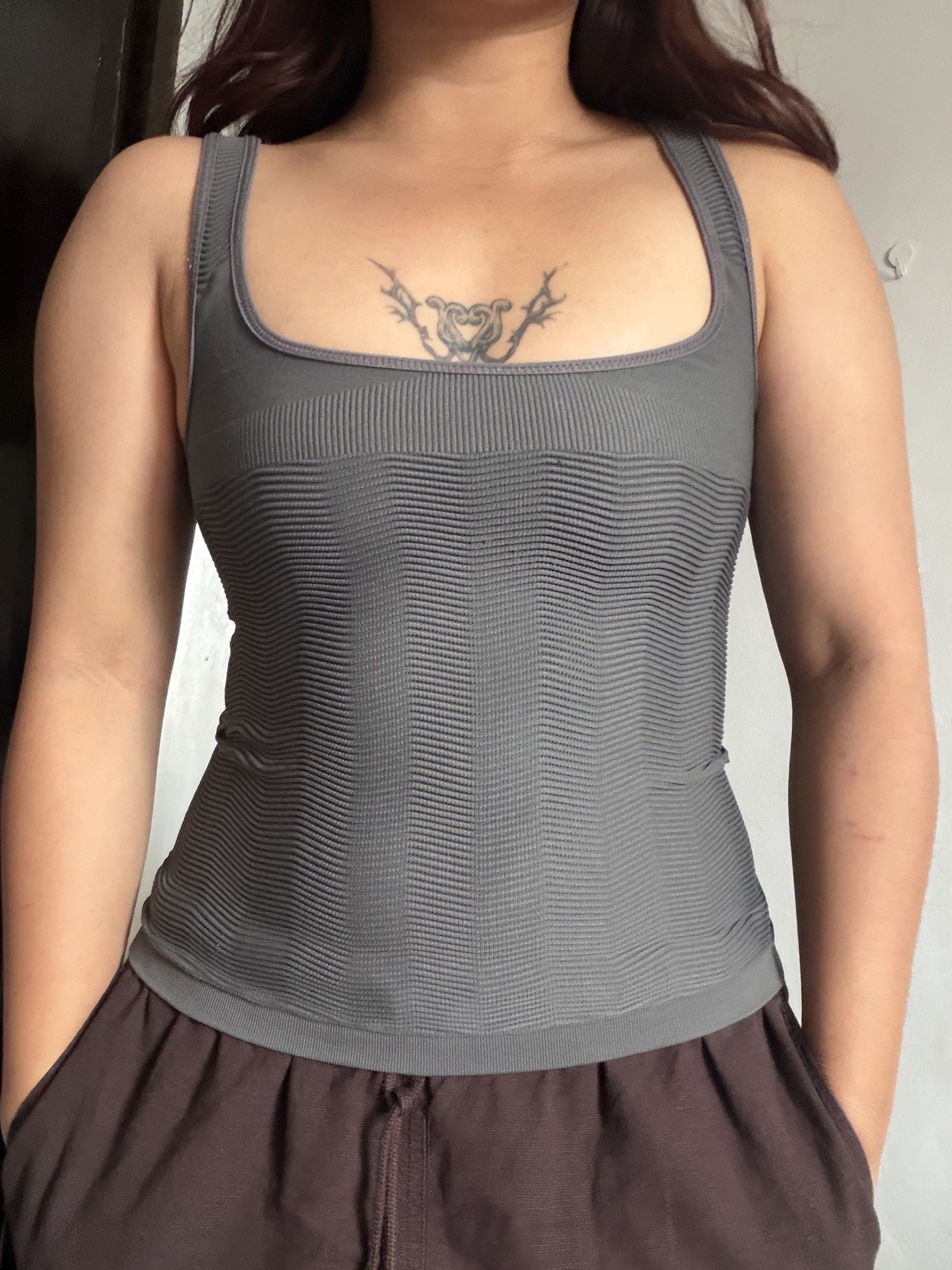 Gray Ribbed Tank Top (Category: Sleeveless) located in Lipa City. Submitted by xynami (Listing ID 1420441853, Image 1). Description: - Gray tank top - Square neckline - spandex type.