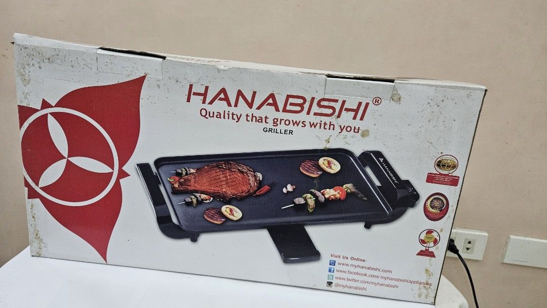 Hanabishi Griller HGrill-50 (Category: BBQ, Grills & Hotpots) located in Quezon City. Submitted by brigdog (Listing ID 1420425110, Image 2). Description: - Hanabishi HGrill-50 - Non-stick, easy-clean grilling plate - Variable heat control - Power-on indicator light - Removable drip tray - Removable power supply for easy storage - AC 230V, 60Hz, 1700W.