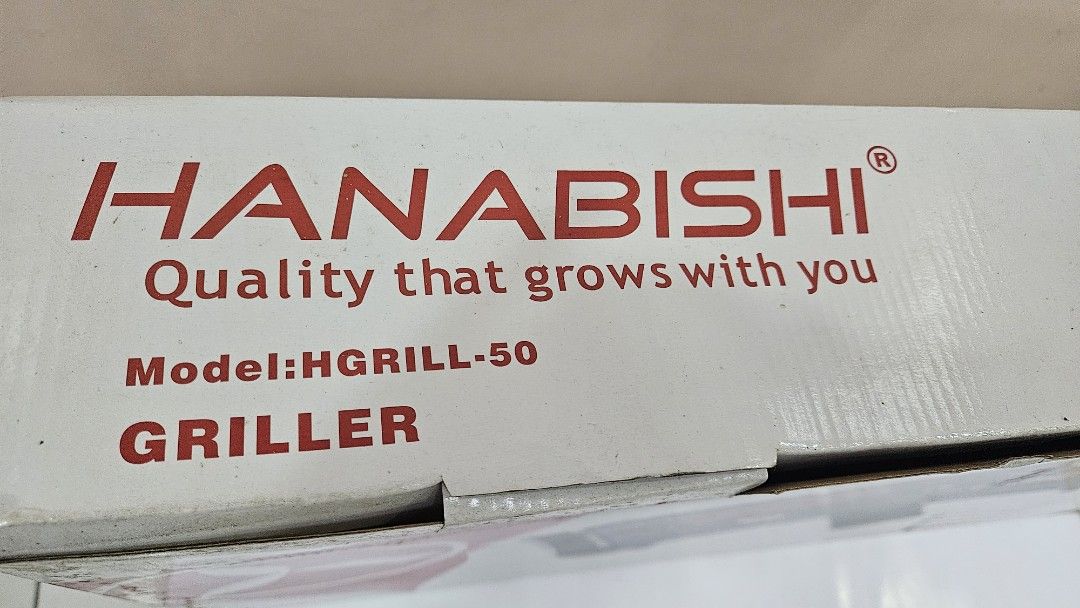 Hanabishi Griller HGrill-50 (Category: BBQ, Grills & Hotpots) located in Quezon City. Submitted by brigdog (Listing ID 1420425110, Image 3). Description: - Hanabishi HGrill-50 - Non-stick, easy-clean grilling plate - Variable heat control - Power-on indicator light - Removable drip tray - Removable power supply for easy storage - AC 230V, 60Hz, 1700W.