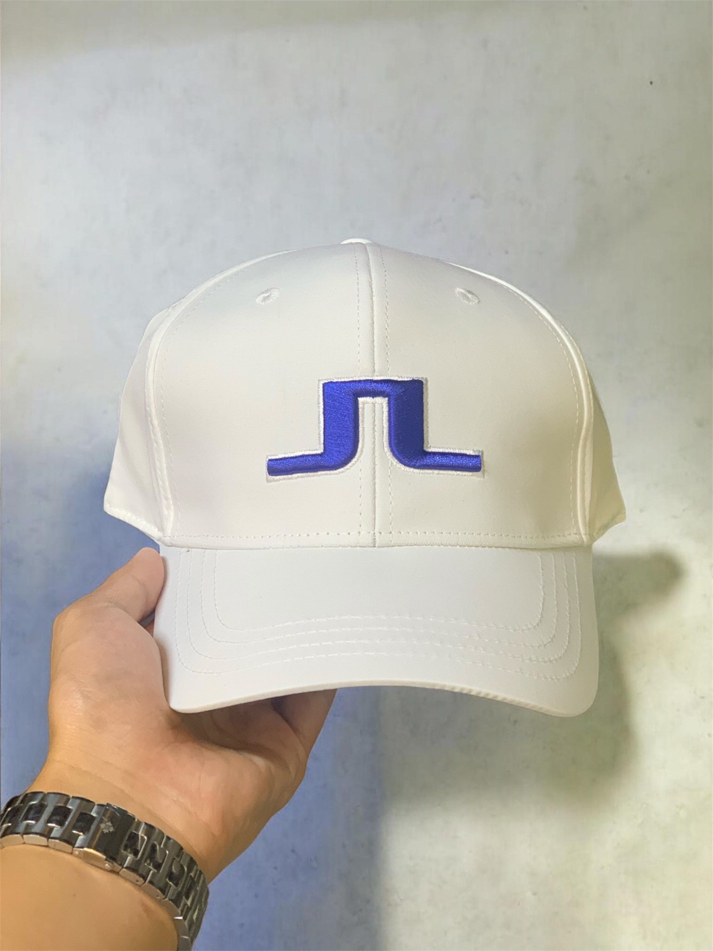 J. LINDEBERG EMBROIDERED CAP (JL J.L) (Category: Caps & Hats) located in Manila. Submitted by scarlett_hope (Listing ID 1420548696, Image 1). Description: 1 SIZE FITS ALL CONDITION: BNEW MOP: GCASH ONLY (PAYMENT FIRST) COURIER: J&T OR LALAMOVE (NO TO PAABONO SA RIDER).