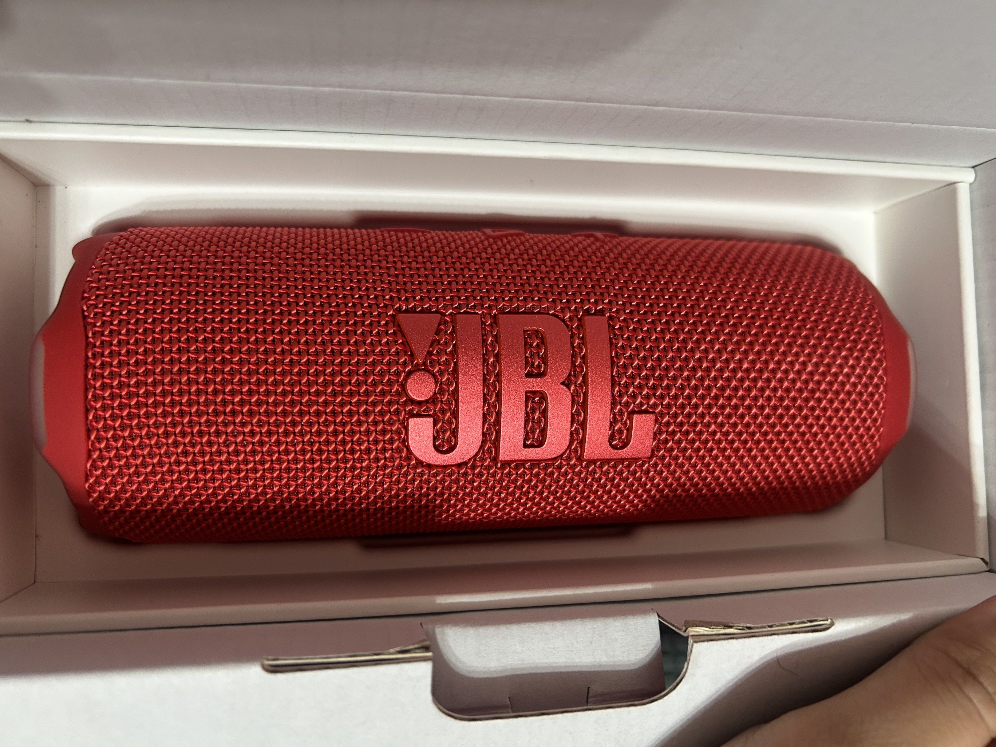 JBL Flip 7 Portable Bluetooth Speaker - Red (Category: Soundbars, Speakers & Amplifiers) located in Cagayan de Oro. Submitted by kxrylle (Listing ID 1420553722, Image 3). Description: JBL Flip 7 is a portable Bluetooth speaker in red. It features Bluetooth v5.4 and has a 16-hour battery life. The speaker has a USB-C port for charging and includes controls for power, Bluetooth pairing, and volume. The box indicates it is waterproof and dustproof..