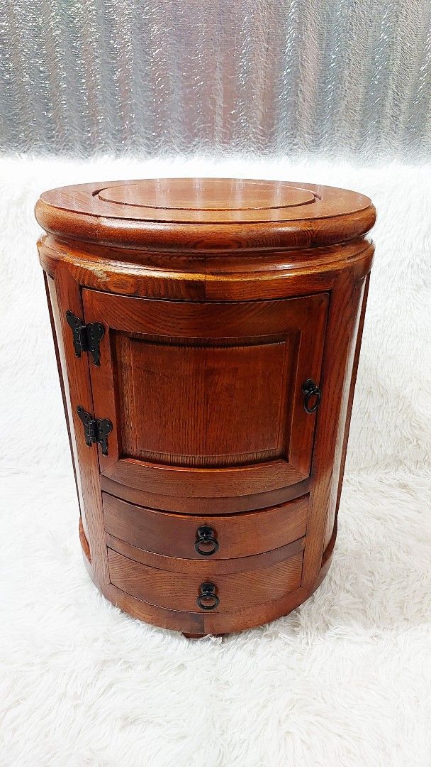 Joseon Dynasty-Inspired Round Storage Stool (Category: Chairs) located in Binan City. Submitted by sakuratreasuresph (Listing ID 1420461457, Image 2). Description: 🪵 Joseon Dynasty–Inspired Round Storage Stool 🪵 Crafted in the spirit of Joseon Dynasty furniture, this round wooden stool showcases timeless Korean design through its smooth curves, rich wood finish, and balanced proportions. Minimal yet elegant, it reflects the era’s appreciation f