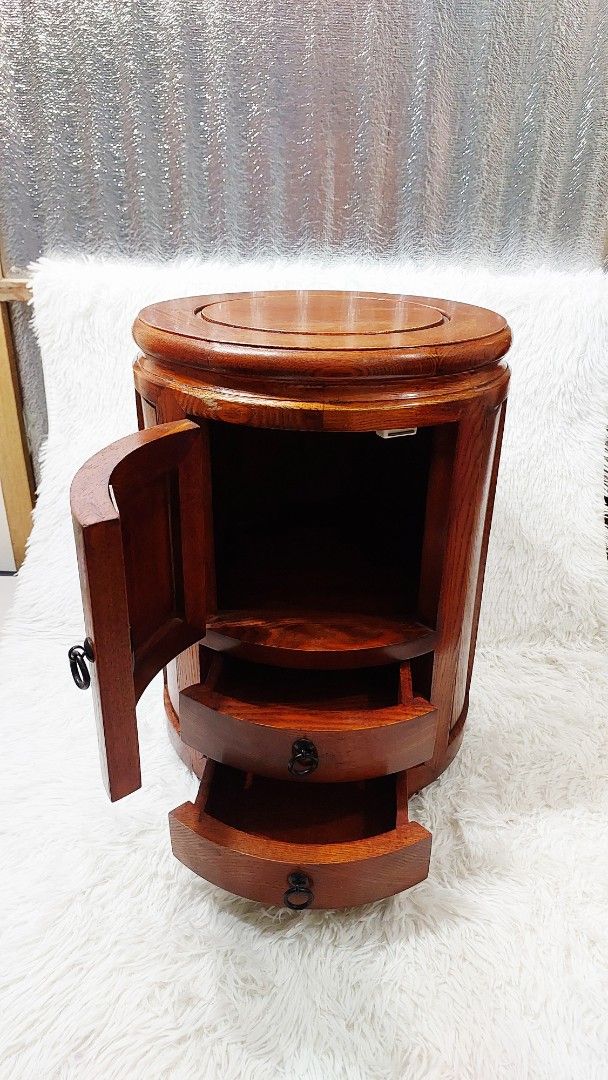 Joseon Dynasty-Inspired Round Storage Stool (Category: Chairs) located in Binan City. Submitted by sakuratreasuresph (Listing ID 1420461457, Image 3). Description: 🪵 Joseon Dynasty–Inspired Round Storage Stool 🪵 Crafted in the spirit of Joseon Dynasty furniture, this round wooden stool showcases timeless Korean design through its smooth curves, rich wood finish, and balanced proportions. Minimal yet elegant, it reflects the era’s appreciation f