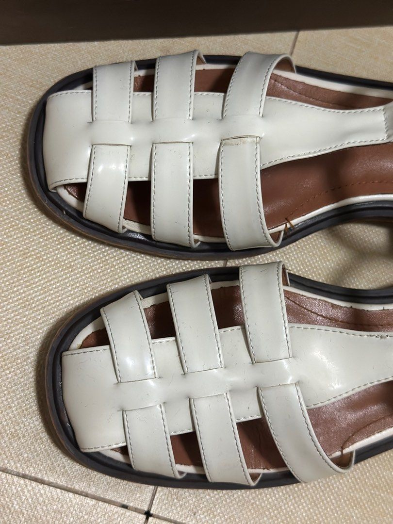 Juanita Studio Leather Sandals (Category: Flats & Sandals) located in Quezon City. Submitted by pre.lovedph (Listing ID 1420522215, Image 2). Description: Juanita Studio - Jacob shoes - White - Size 40 - Original Price: Php2799 RFS: Decluttering.