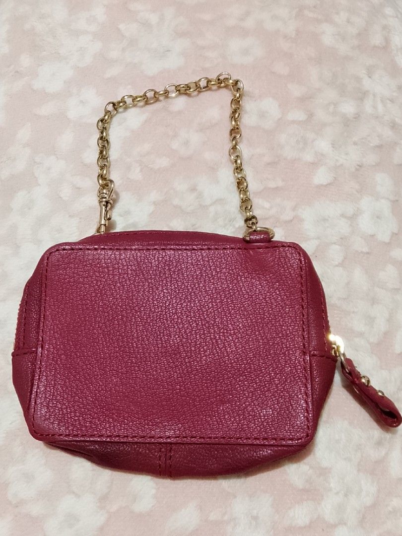 Juicy Couture Studded Coin Purse (Category: Purses & Pouches) located in Roxas City. Submitted by tabot (Listing ID 1420537361, Image 2). Description: - My pre-owned stuff from abroad - Burgundy exterior with gold-tone studs - Gold Chain strap - Leopard print lining - Small interior pocket - Ideal for cards or paper bills .