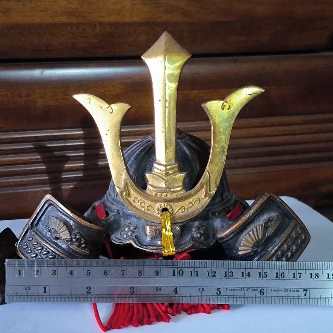 Kabuto samurai warrior metal helmet display (Category: Figurines & Statues) located in Manila. Submitted by puppysharky (Listing ID 1420365288, Image 2). Description: price is for 2 pcs kabuto samurai helmet for display with missing parts. red tassel of bigger helmet is not original. pls review size and condition carefully in the pics provided RFS- decluttering shipping fee c/o buyer full payment including sf before ship out via j&t No COD/COP pa