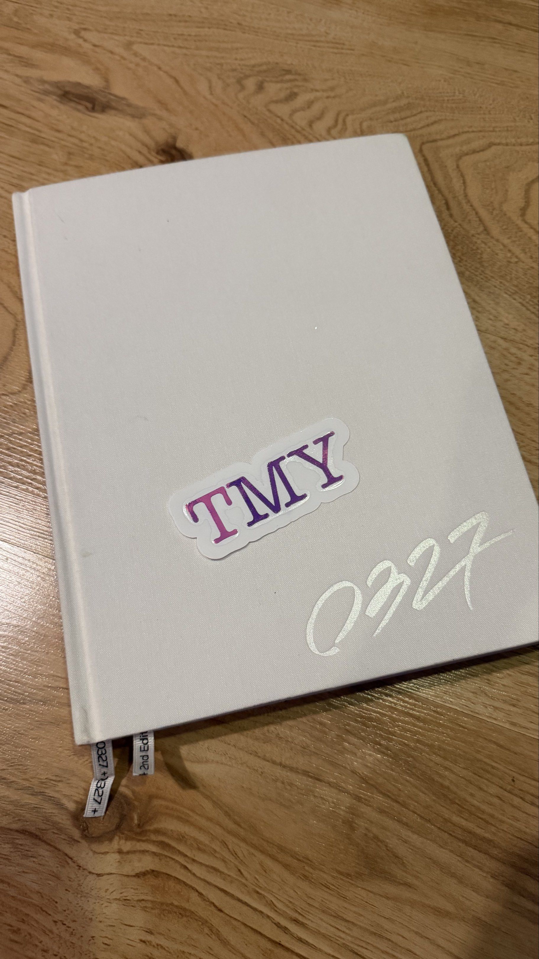 LALISA 0327 PHOTOBOOK (Category: K-Wave Merchandise) located in Bacolod City. Submitted by tmyshop21 (Listing ID 1420413614, Image 1). Description: - TMY Notebook (Second Edition) - White cover with gradient "TMY" sticker - "0327" printed on the cover - Includes two ribbon bookmarks.